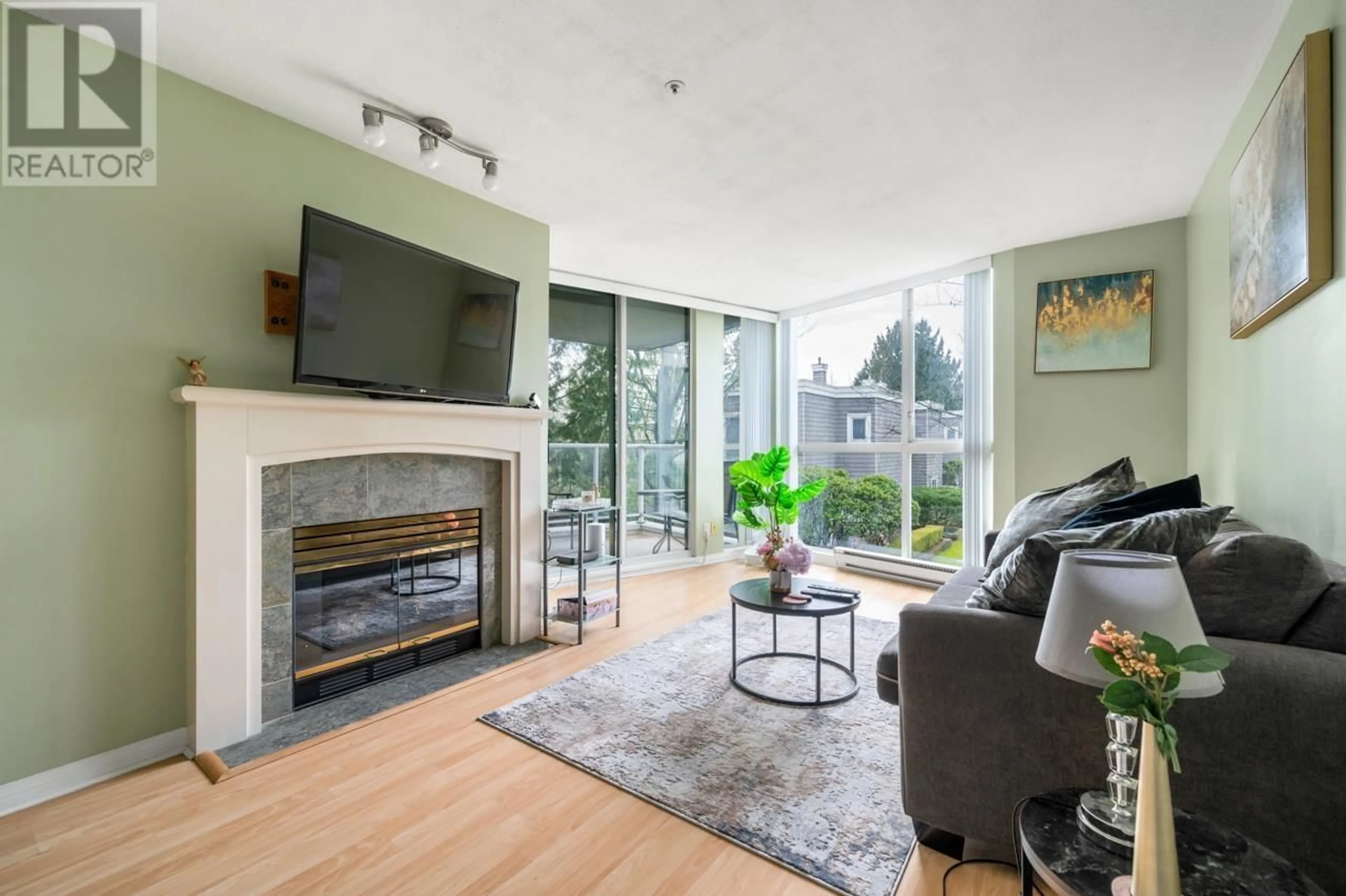 Living room with furniture, unknown for 207 - 8450 JELLICOE STREET, Vancouver British Columbia V5S4S9