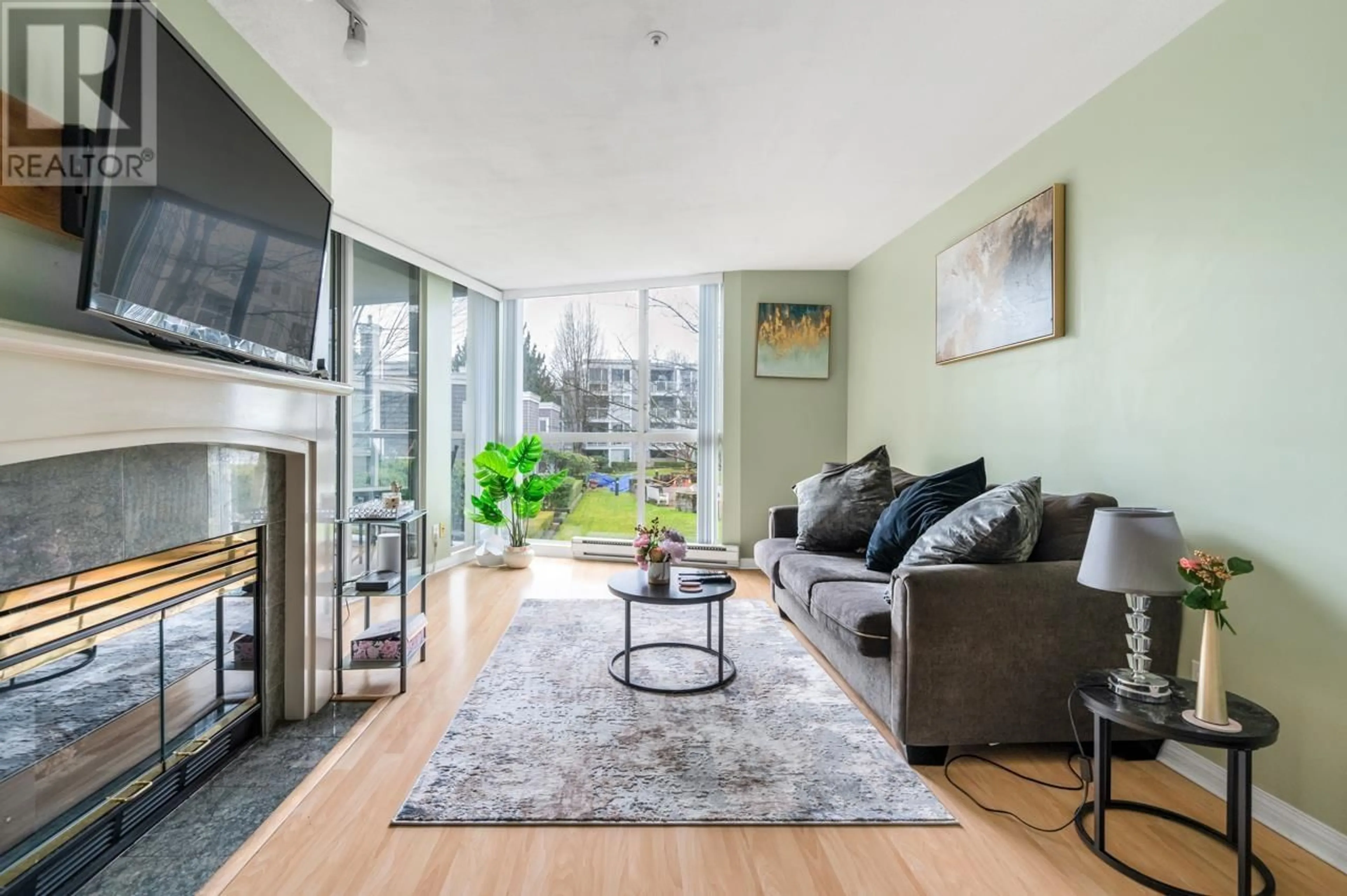 Living room with furniture, unknown for 207 - 8450 JELLICOE STREET, Vancouver British Columbia V5S4S9