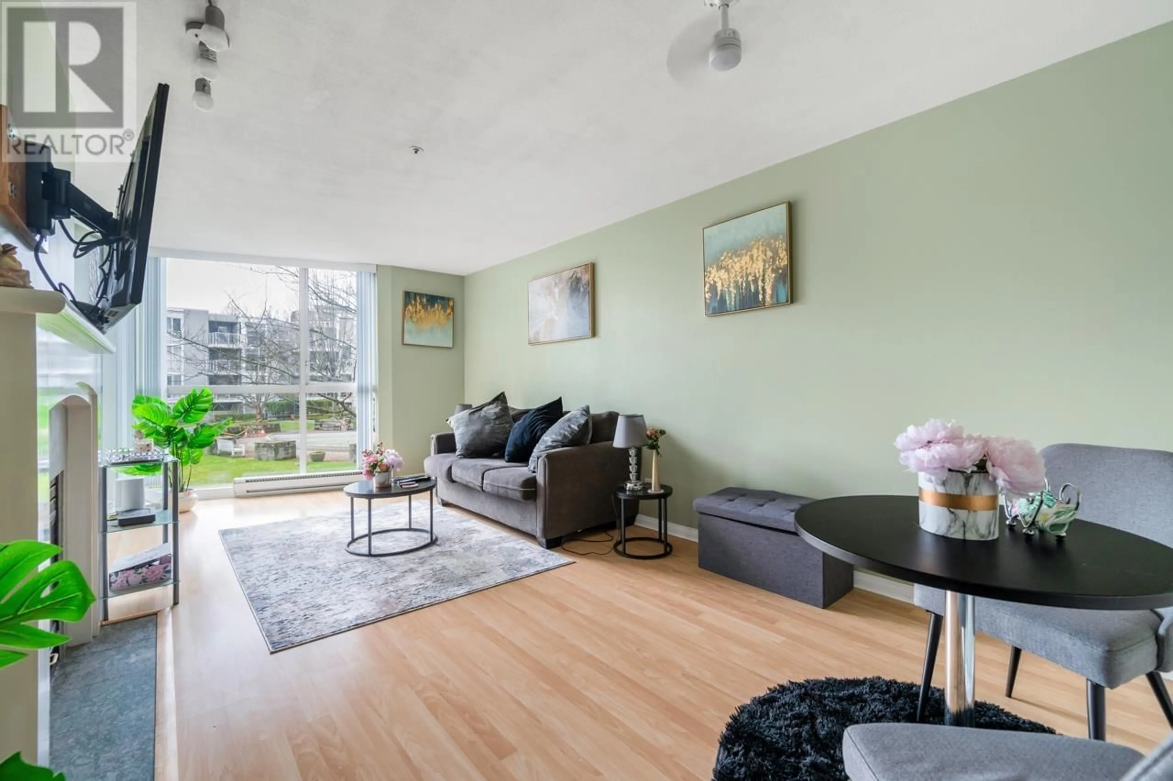 Living room with furniture, unknown for 207 - 8450 JELLICOE STREET, Vancouver British Columbia V5S4S9