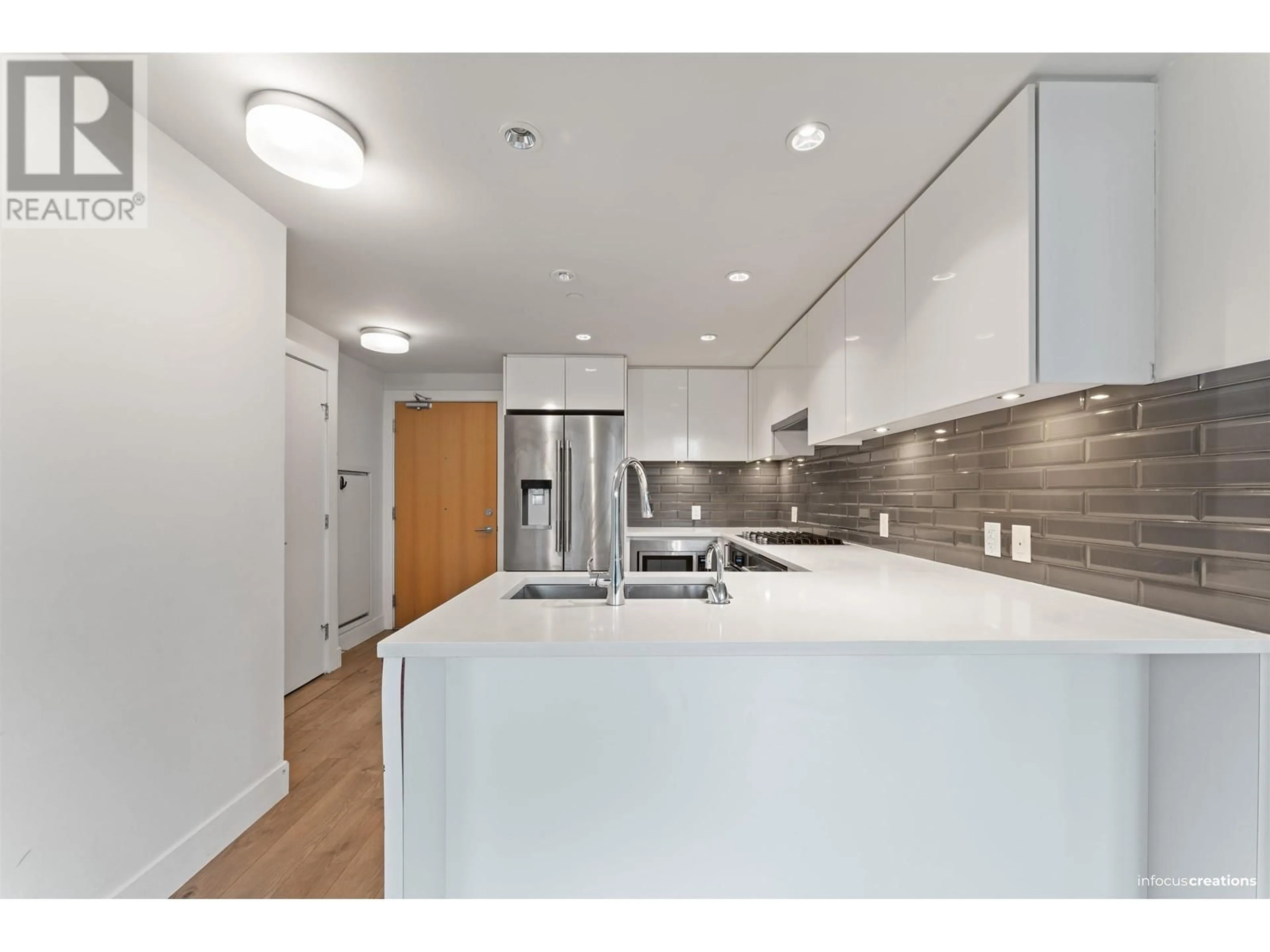 Open concept kitchen, unknown for 609 - 3451 SAWMILL CRESCENT, Vancouver British Columbia V5S0H3