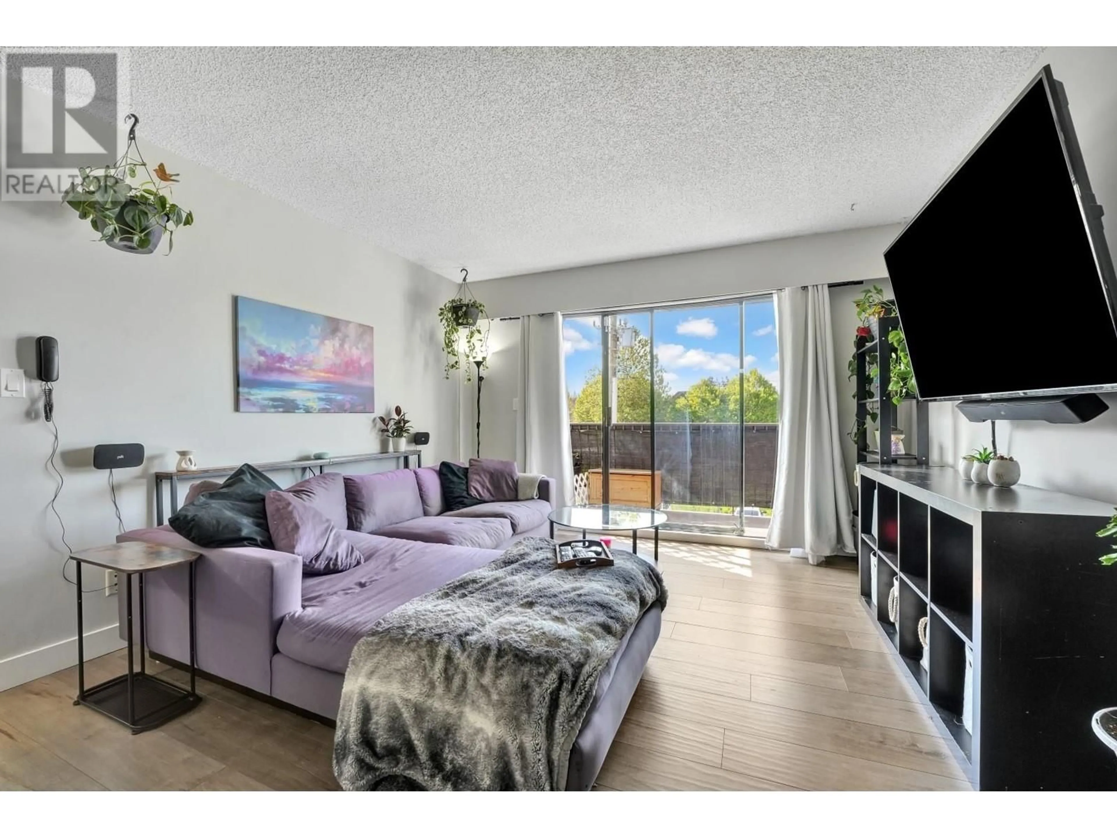 Living room with furniture, unknown for 205 - 2425 SHAUGHNESSY STREET, Port Coquitlam British Columbia V3C3E6
