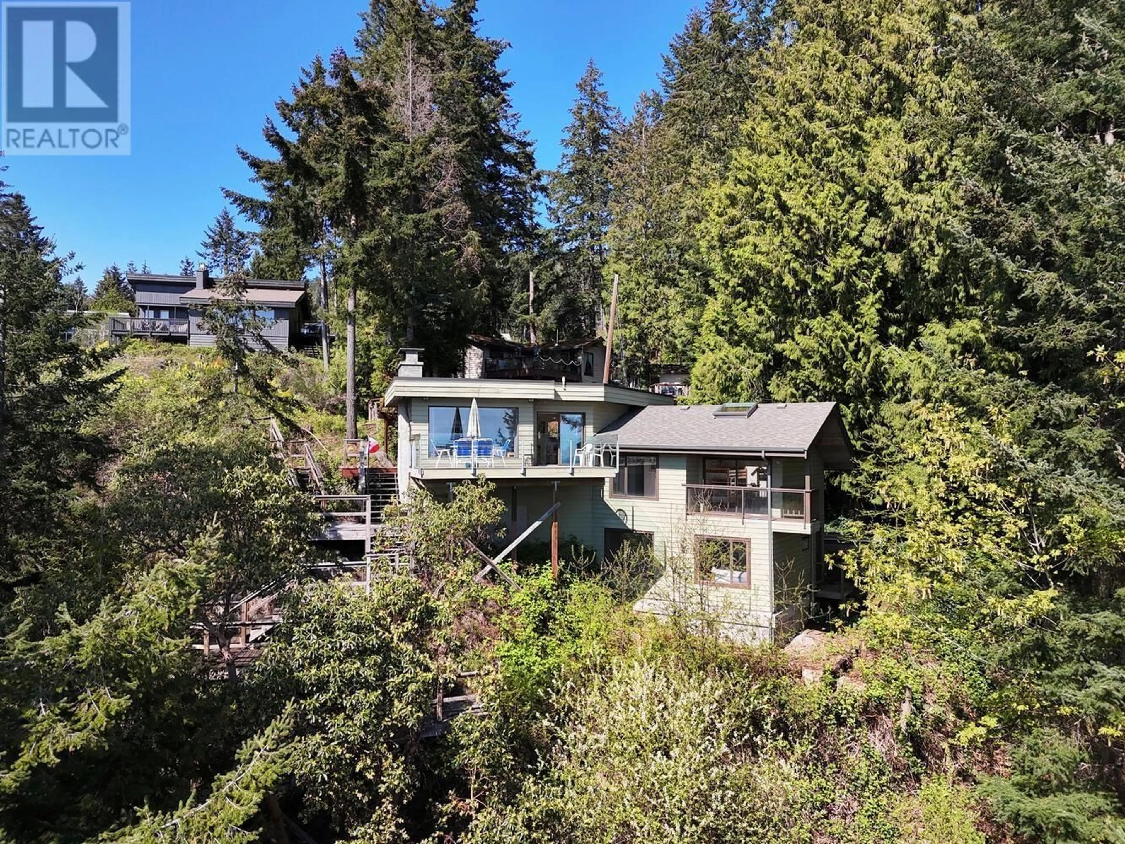 A pic from outside/outdoor area/front of a property/back of a property/a pic from drone, unknown for 7297 BELLE ROAD, Sechelt British Columbia V7Z0T3
