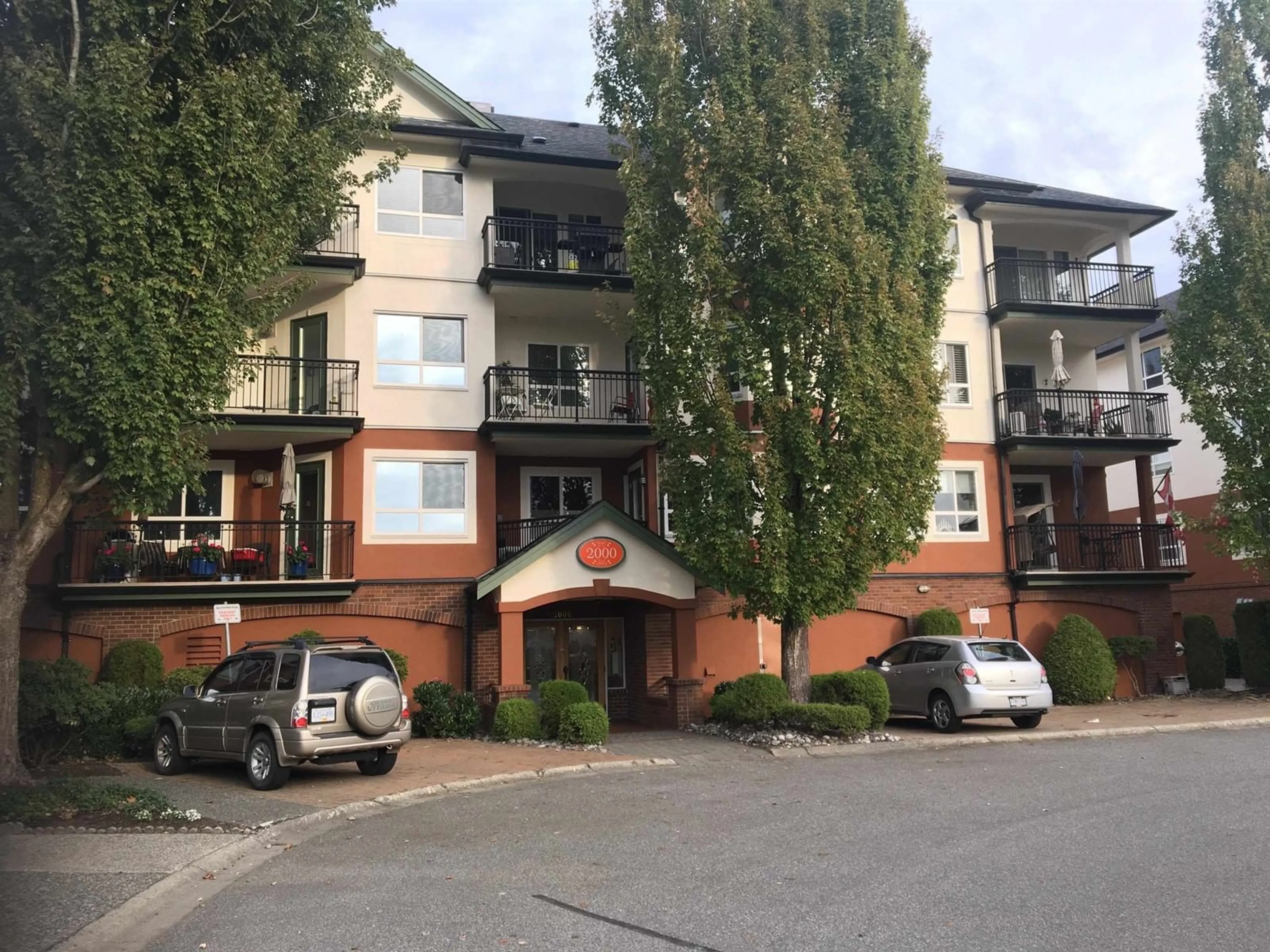 A pic from outside/outdoor area/front of a property/back of a property/a pic from drone, unknown for 2407 - 8485 YOUNG ROAD, Chilliwack British Columbia V2P7Y7