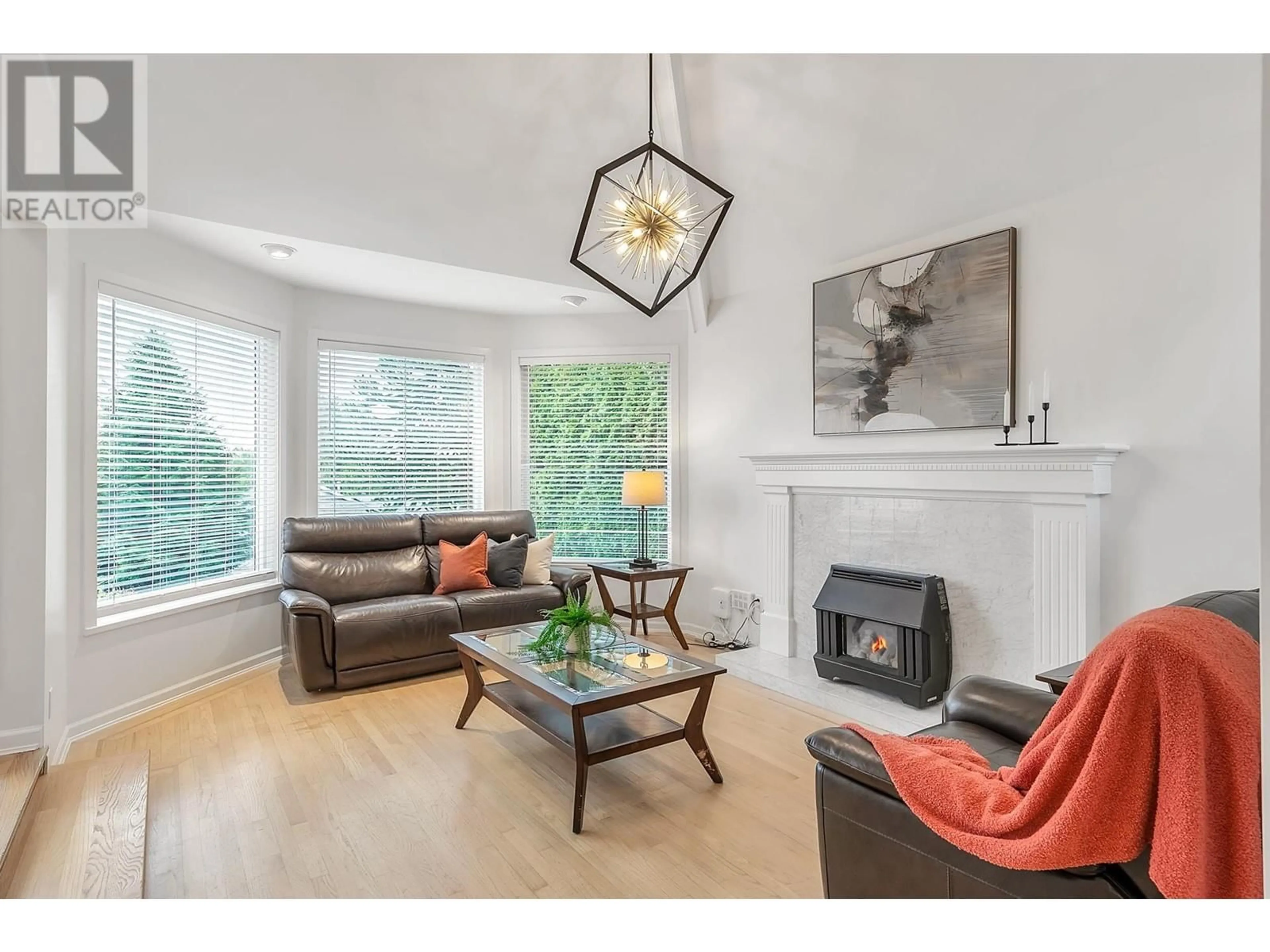 Living room with furniture, wood/laminate floor for 1163 FRASERVIEW STREET, Port Coquitlam British Columbia V3C5H2