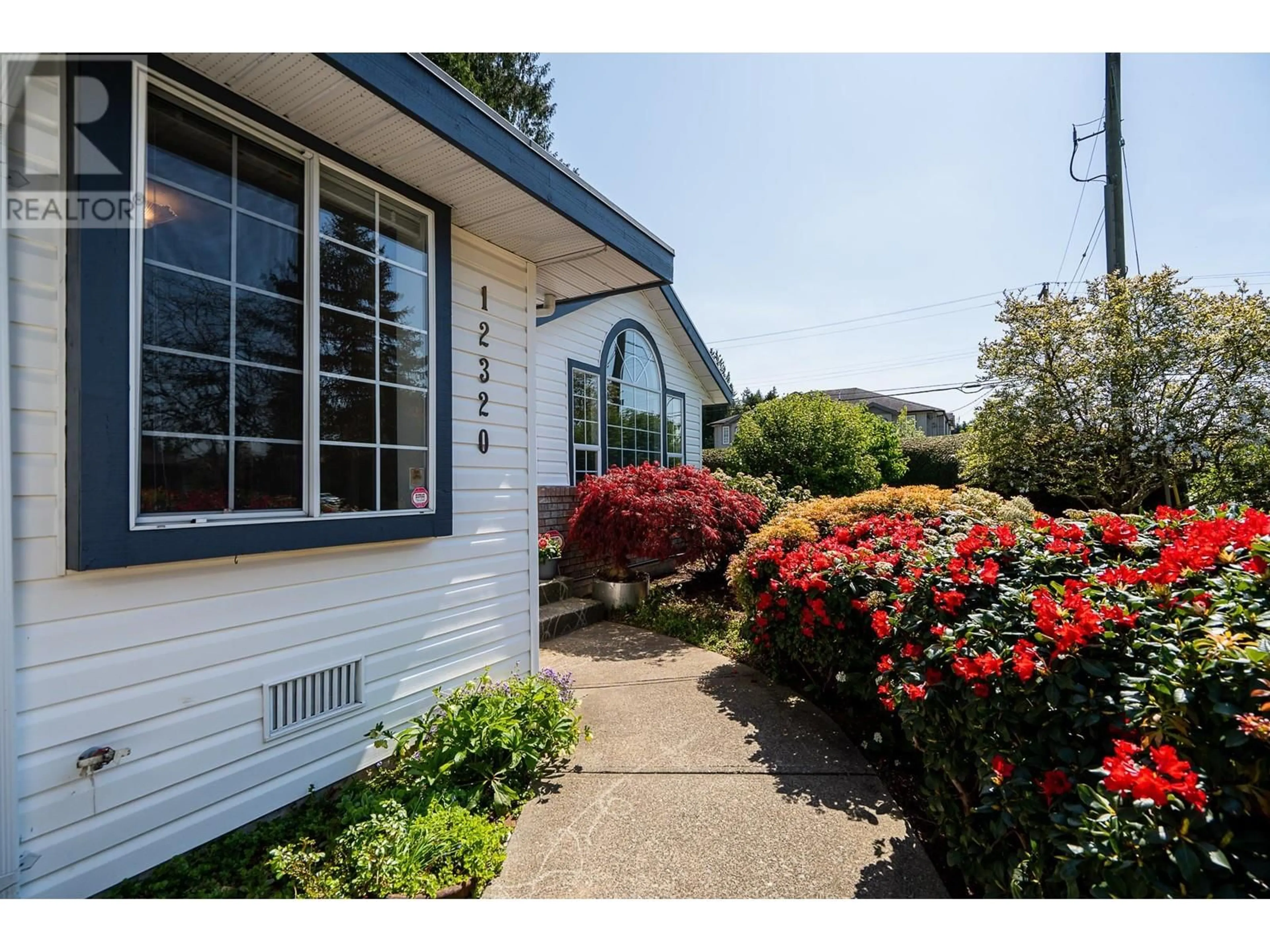 Home with vinyl exterior material, unknown for 12320 206 STREET, Maple Ridge British Columbia V2X0M6