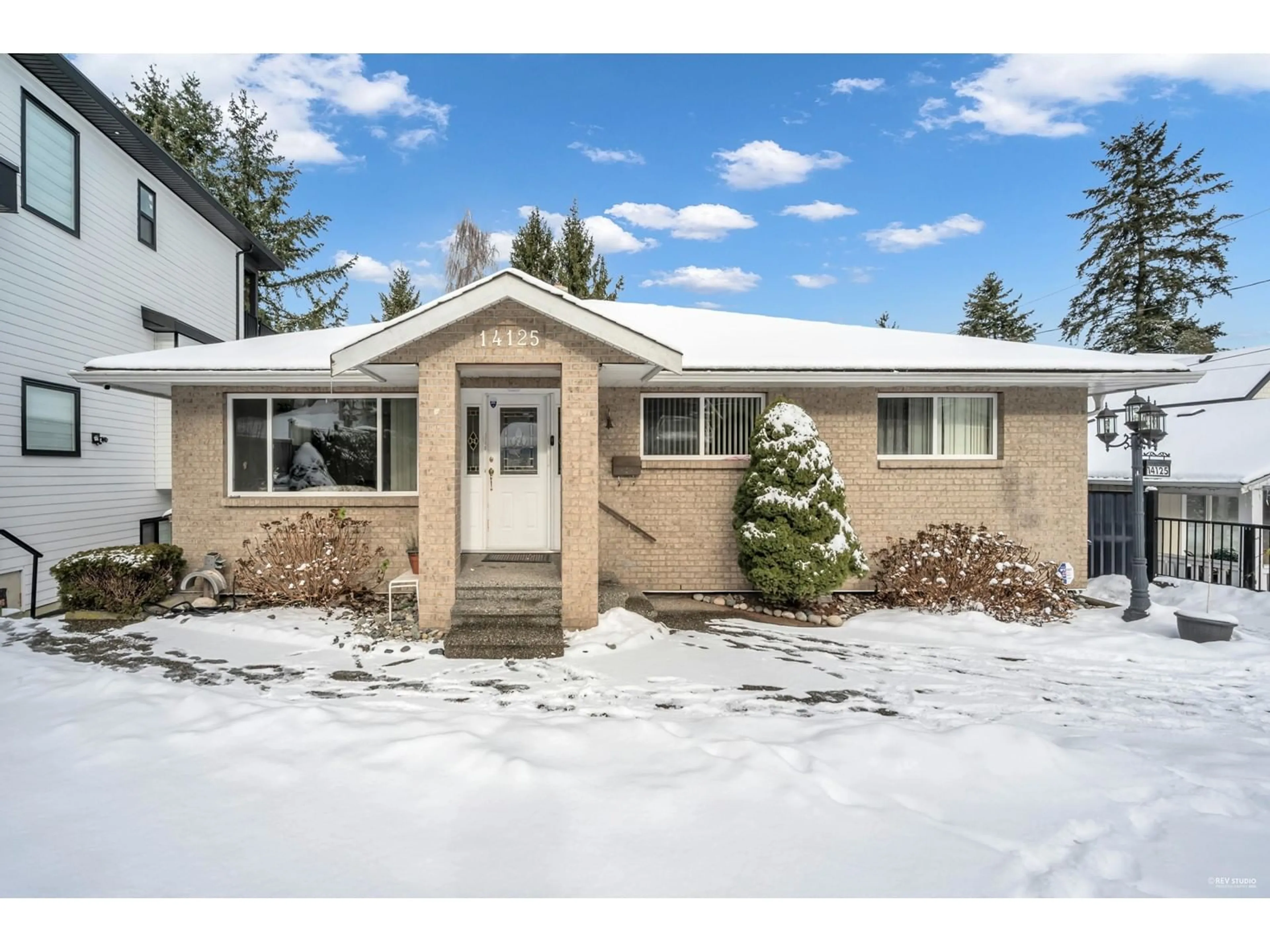 Home with vinyl exterior material, street for 14125 115, Surrey British Columbia V3R2P7