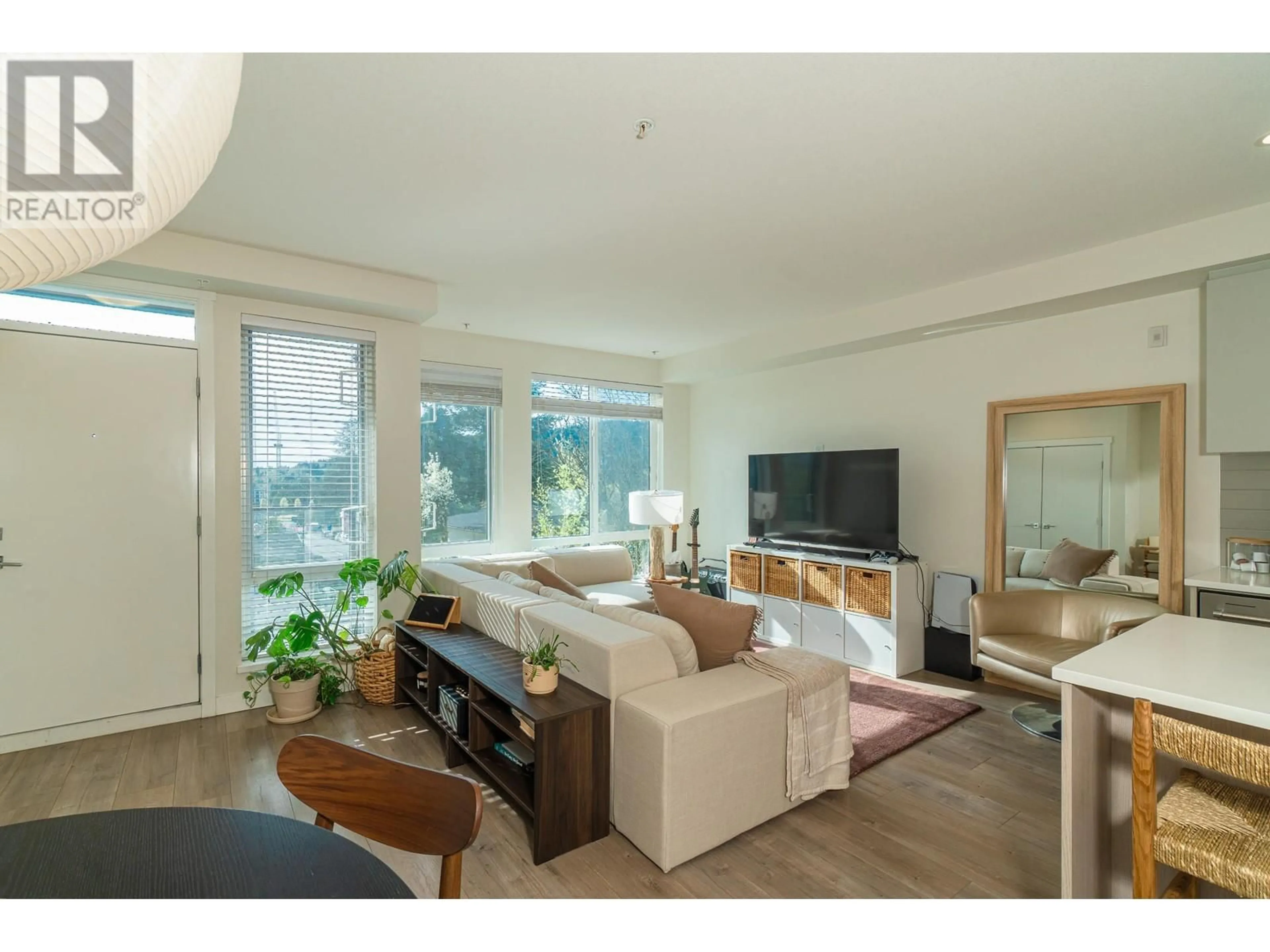 Living room with furniture, wood/laminate floor for 205 - 708 LEA AVENUE, Coquitlam British Columbia V3J4H5