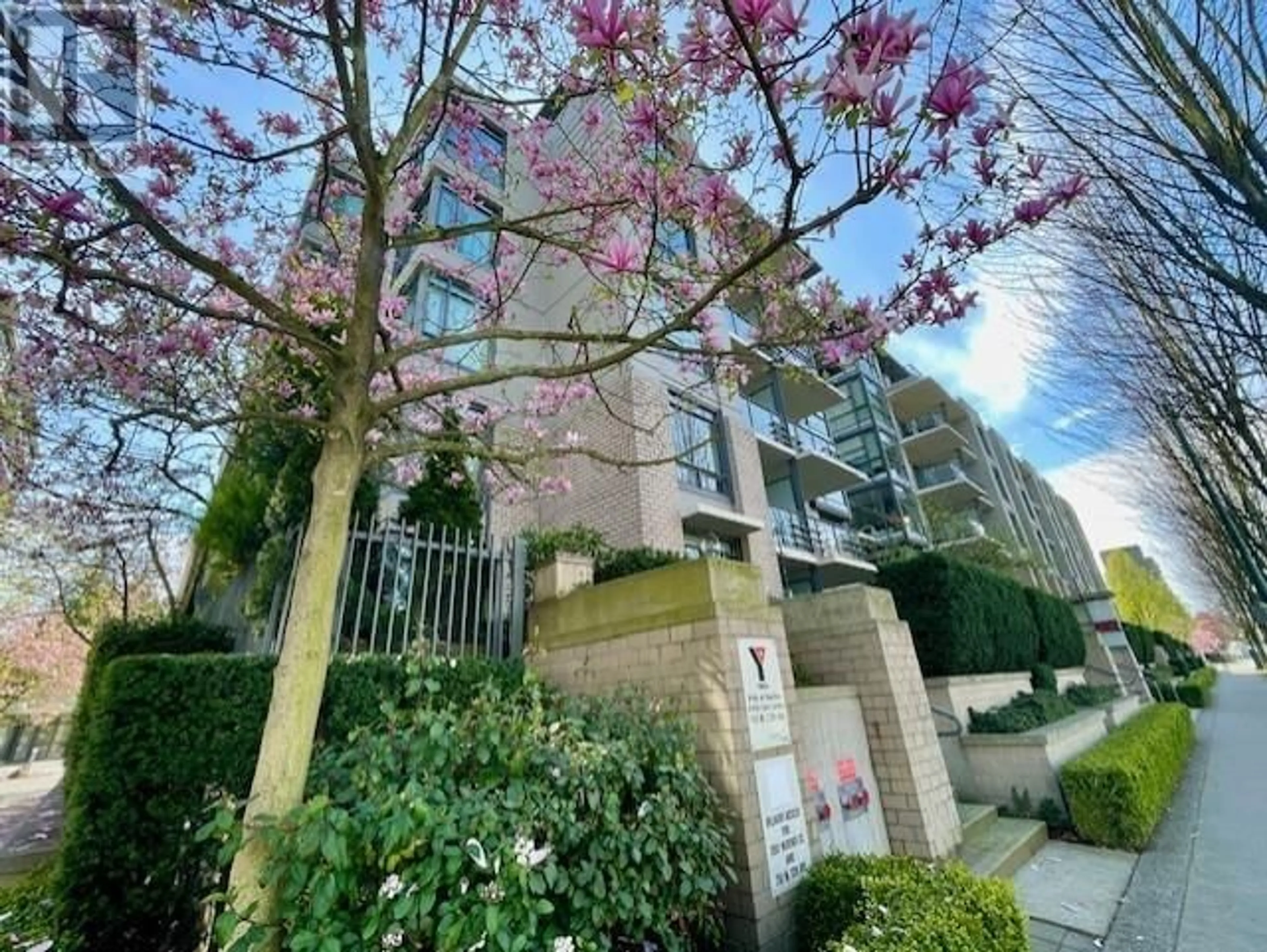 A pic from outside/outdoor area/front of a property/back of a property/a pic from drone, street for 311 - 750 12TH AVENUE, Vancouver British Columbia V6Z0A3