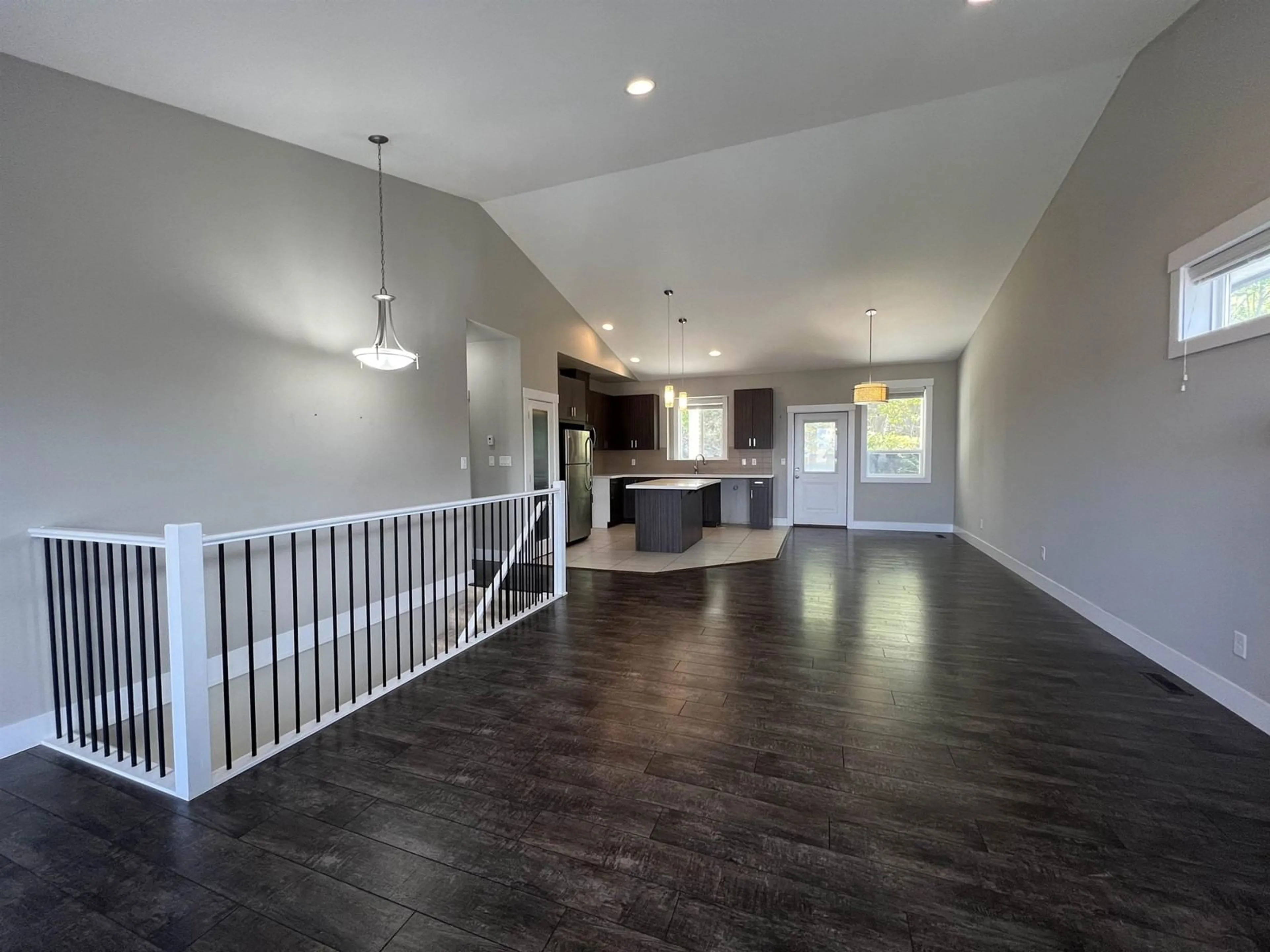 Open concept kitchen, wood/laminate floor for 46260 TOURNIER PLACE, Chilliwack British Columbia V2R6A2