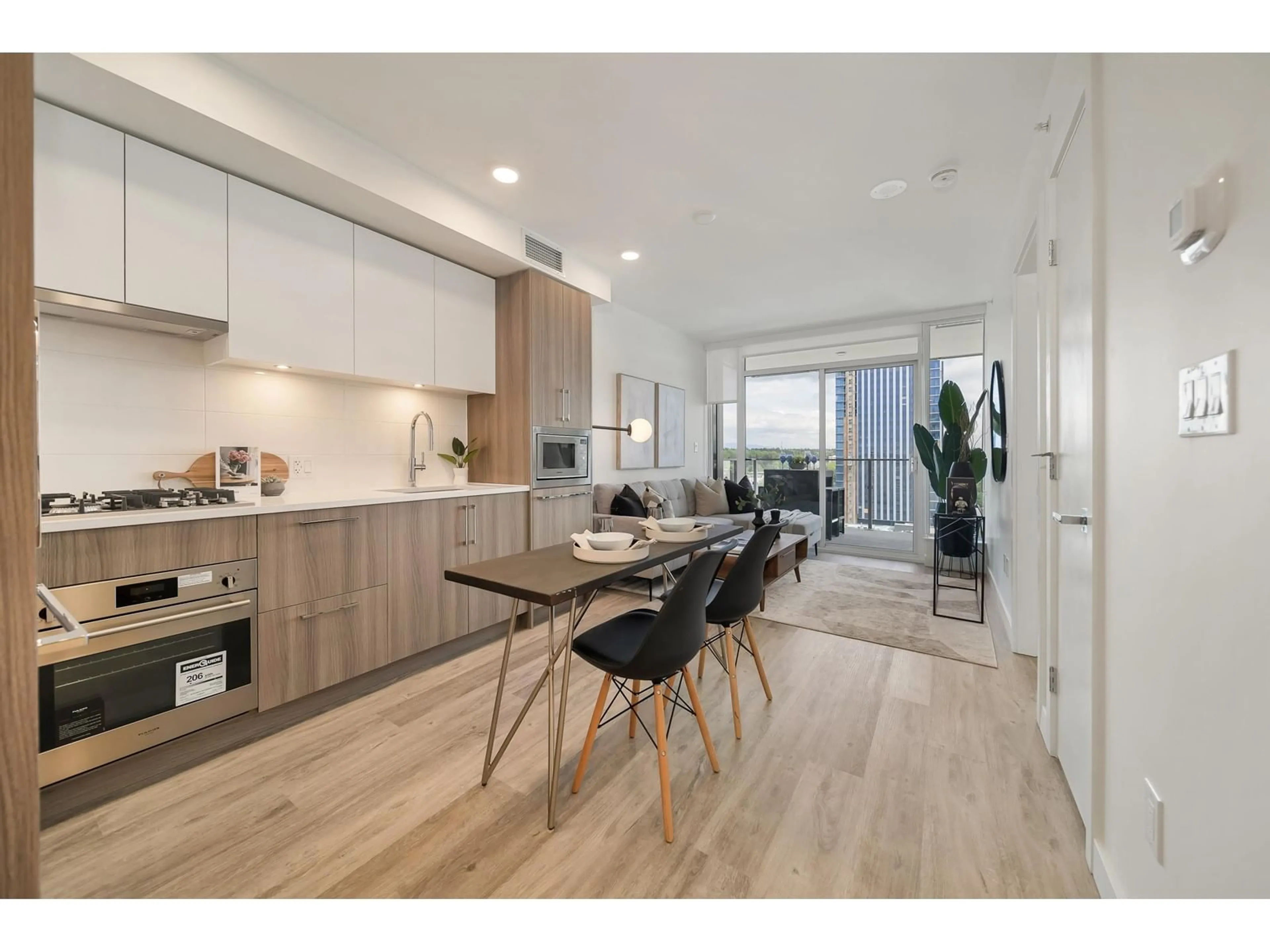 Open concept kitchen, wood/laminate floor for 1808 - 9675 KING GEORGE, Surrey British Columbia V3T2V3
