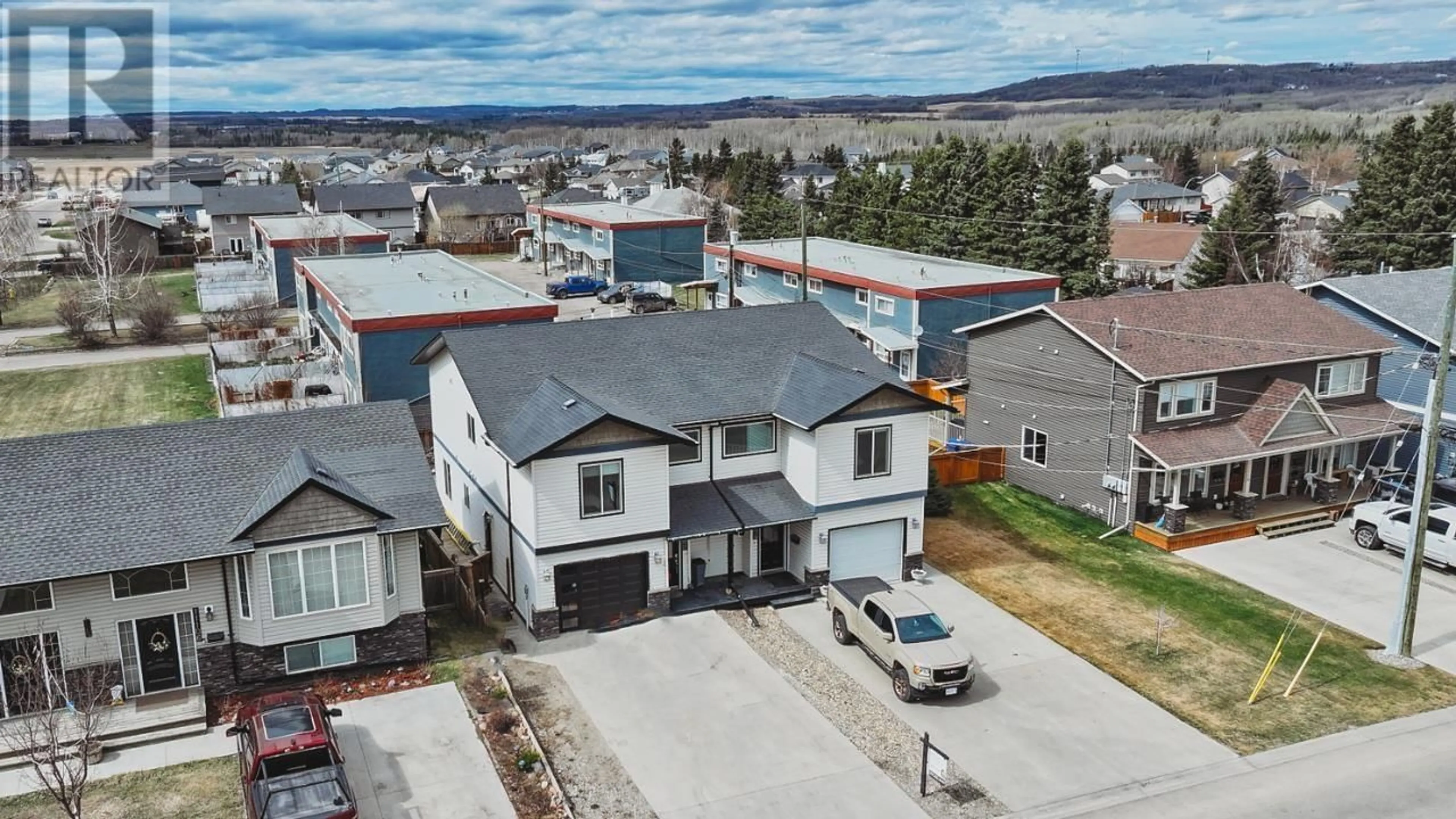 A pic from outside/outdoor area/front of a property/back of a property/a pic from drone, unknown for 11112 106 STREET, Fort St. John British Columbia V1J6M4