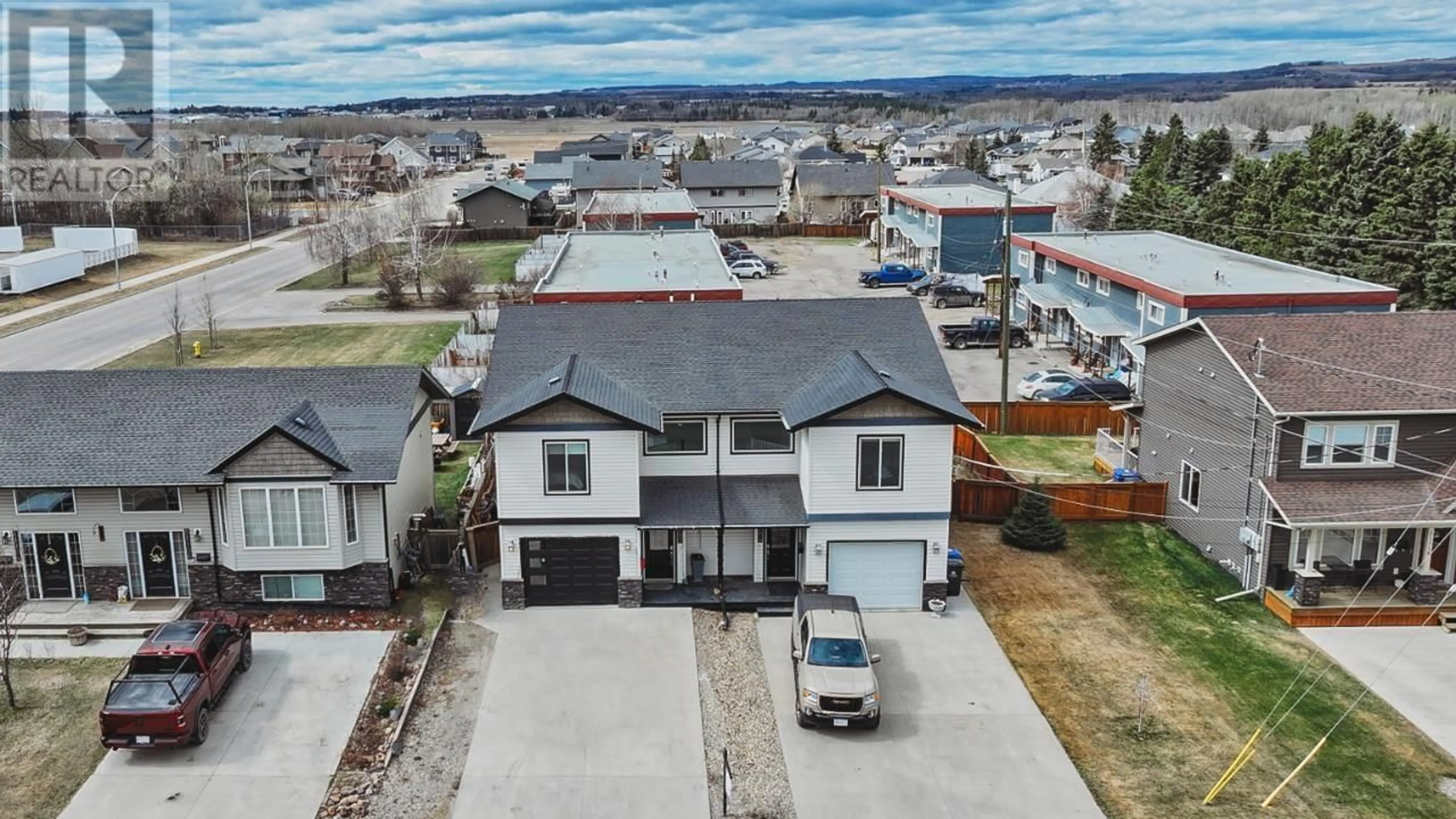 A pic from outside/outdoor area/front of a property/back of a property/a pic from drone, street for 11112 106 STREET, Fort St. John British Columbia V1J6M4