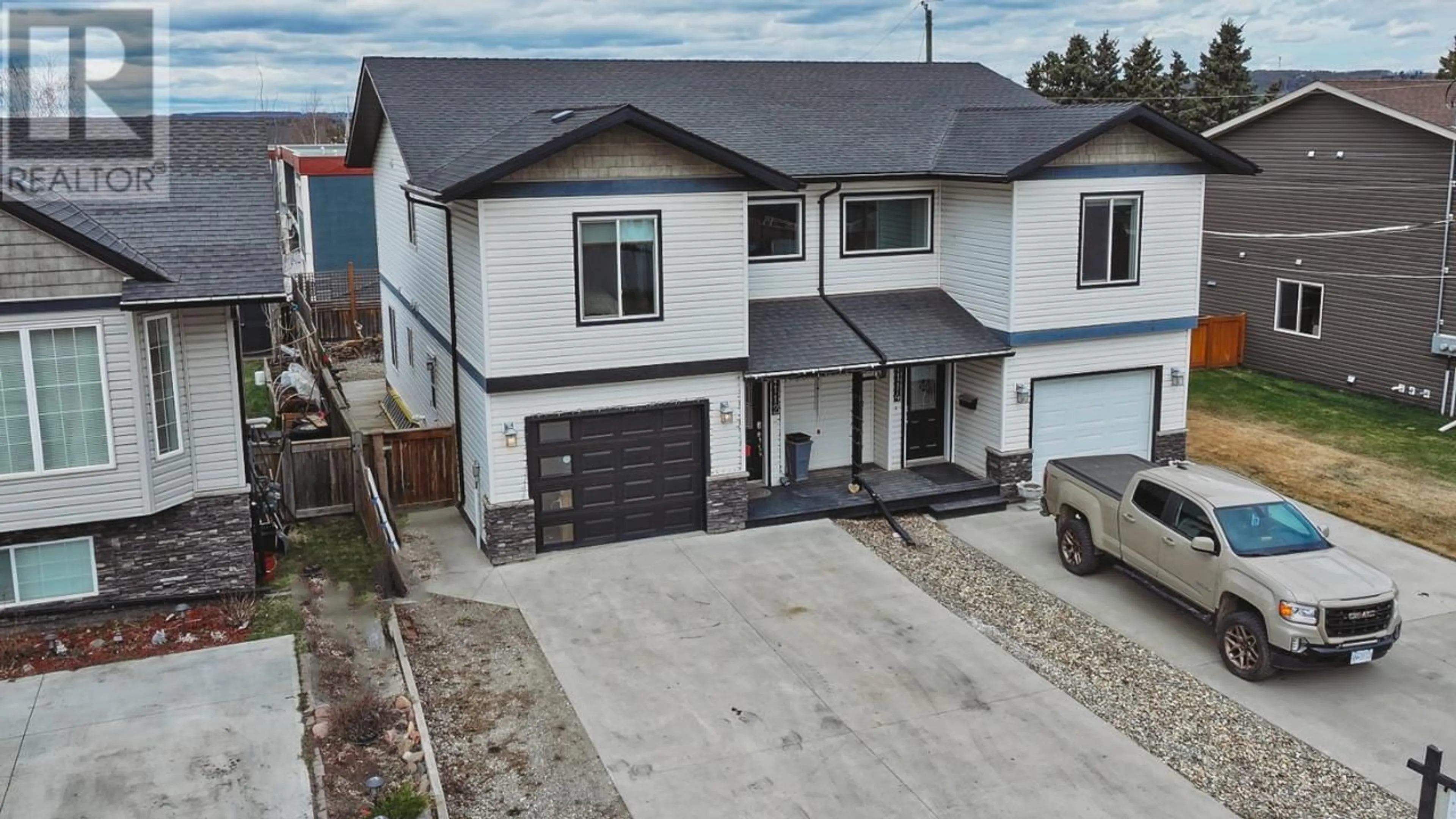 A pic from outside/outdoor area/front of a property/back of a property/a pic from drone, street for 11112 106 STREET, Fort St. John British Columbia V1J6M4
