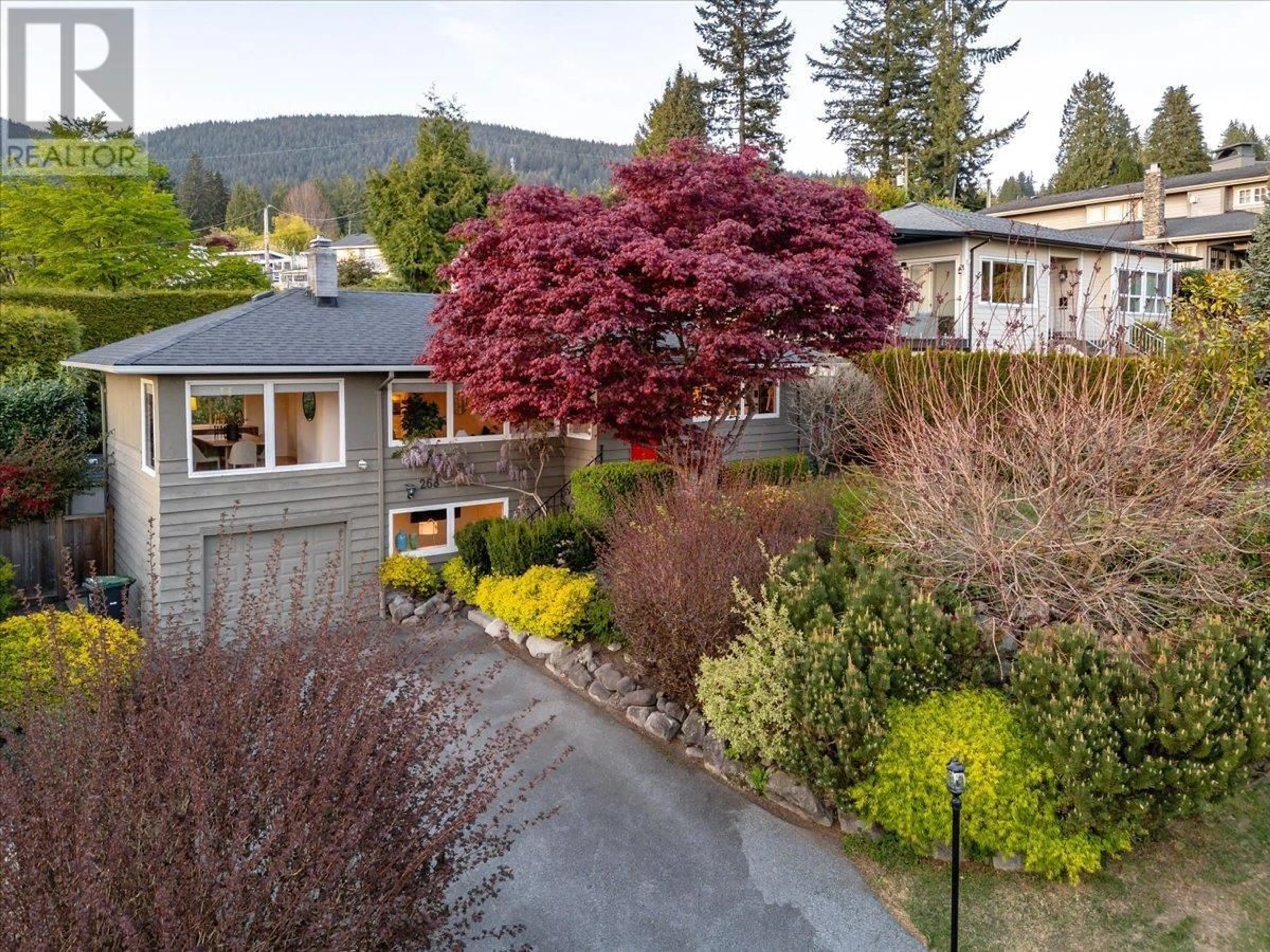 A pic from outside/outdoor area/front of a property/back of a property/a pic from drone, mountain view for 268 HOLYROOD ROAD, North Vancouver British Columbia V7N2R5