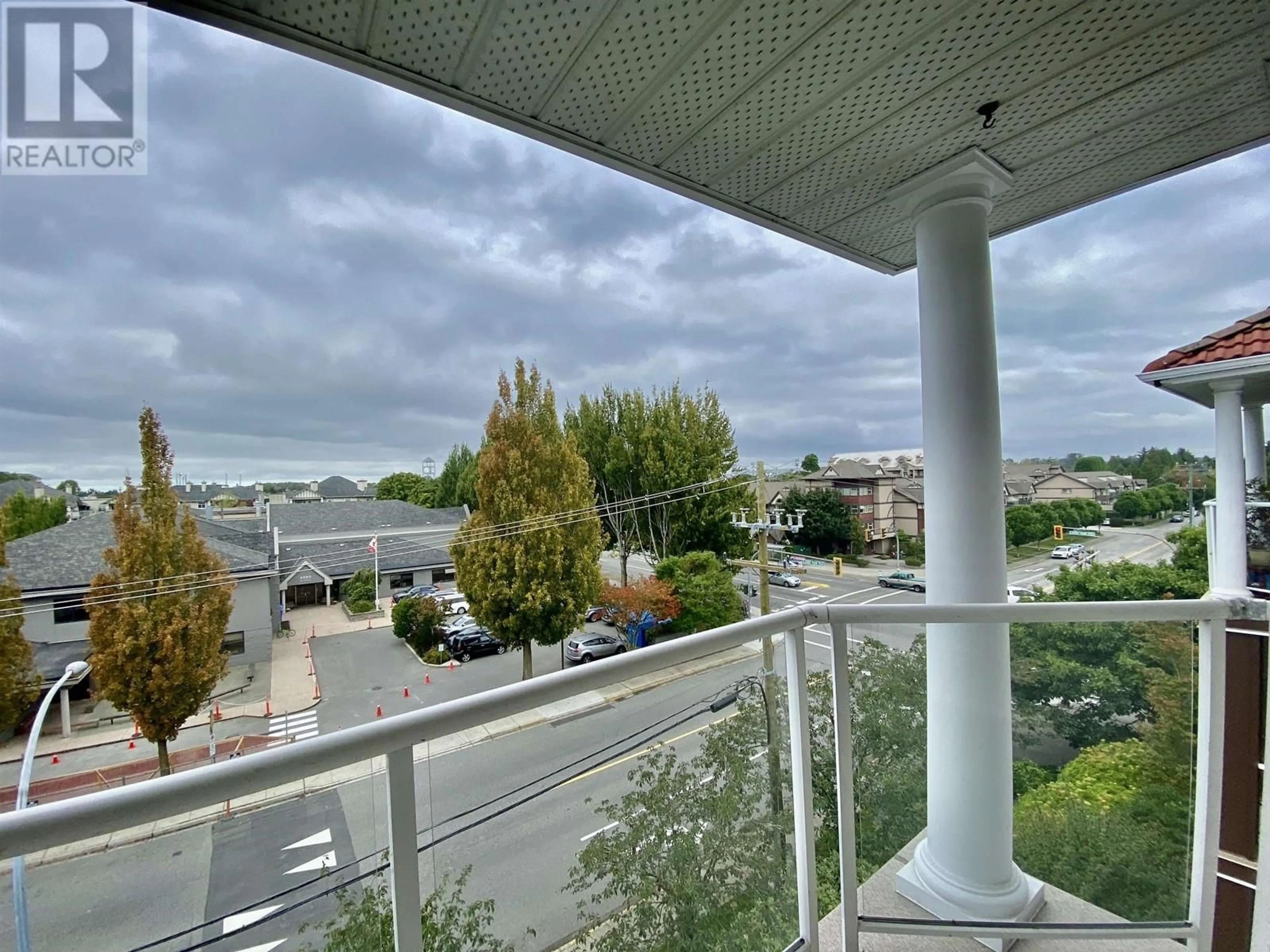 Balcony in the apartment, city buildings view from balcony for 409 - 4768 53RD STREET, Delta British Columbia V4K2Z1