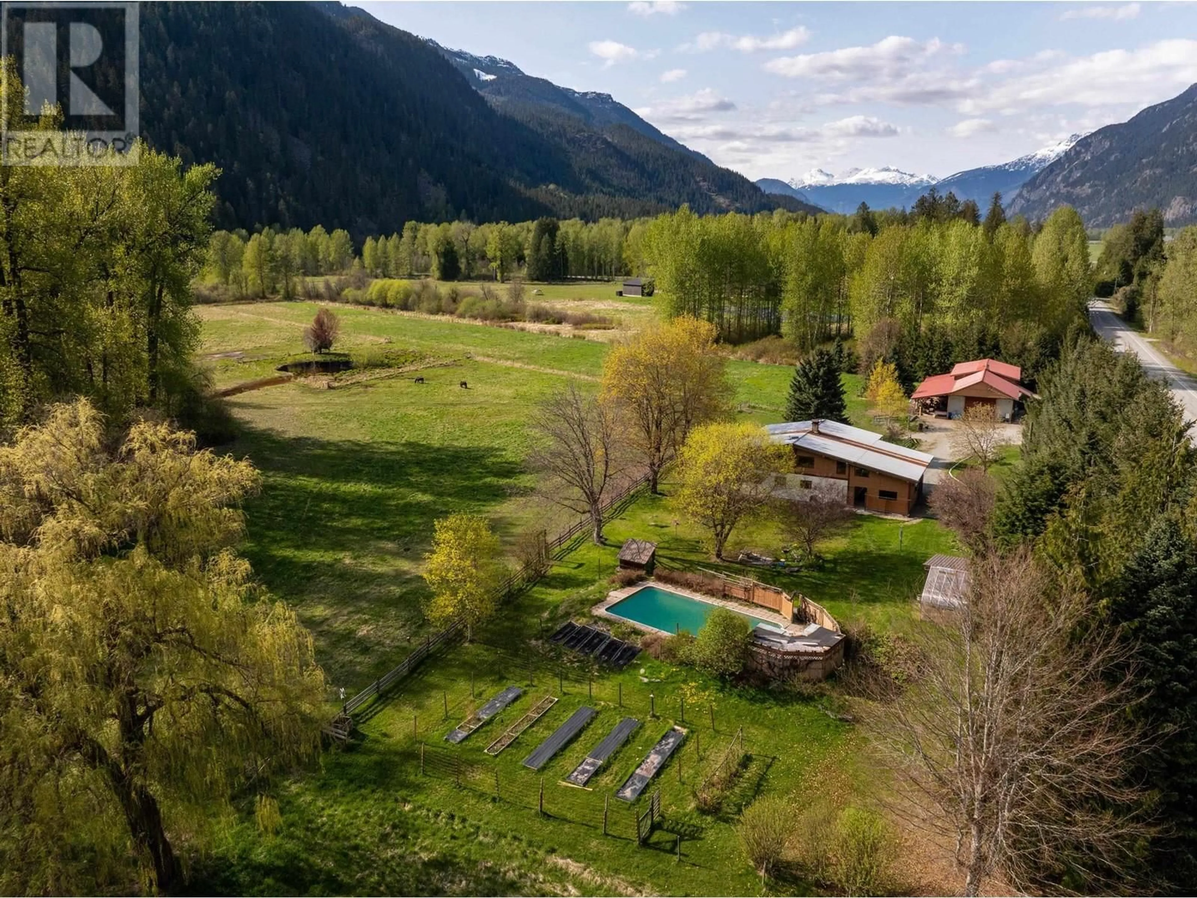 A pic from outside/outdoor area/front of a property/back of a property/a pic from drone, mountain view for 7869 PEMBERTON MEADOWS ROAD, Pemberton British Columbia V0N2L2