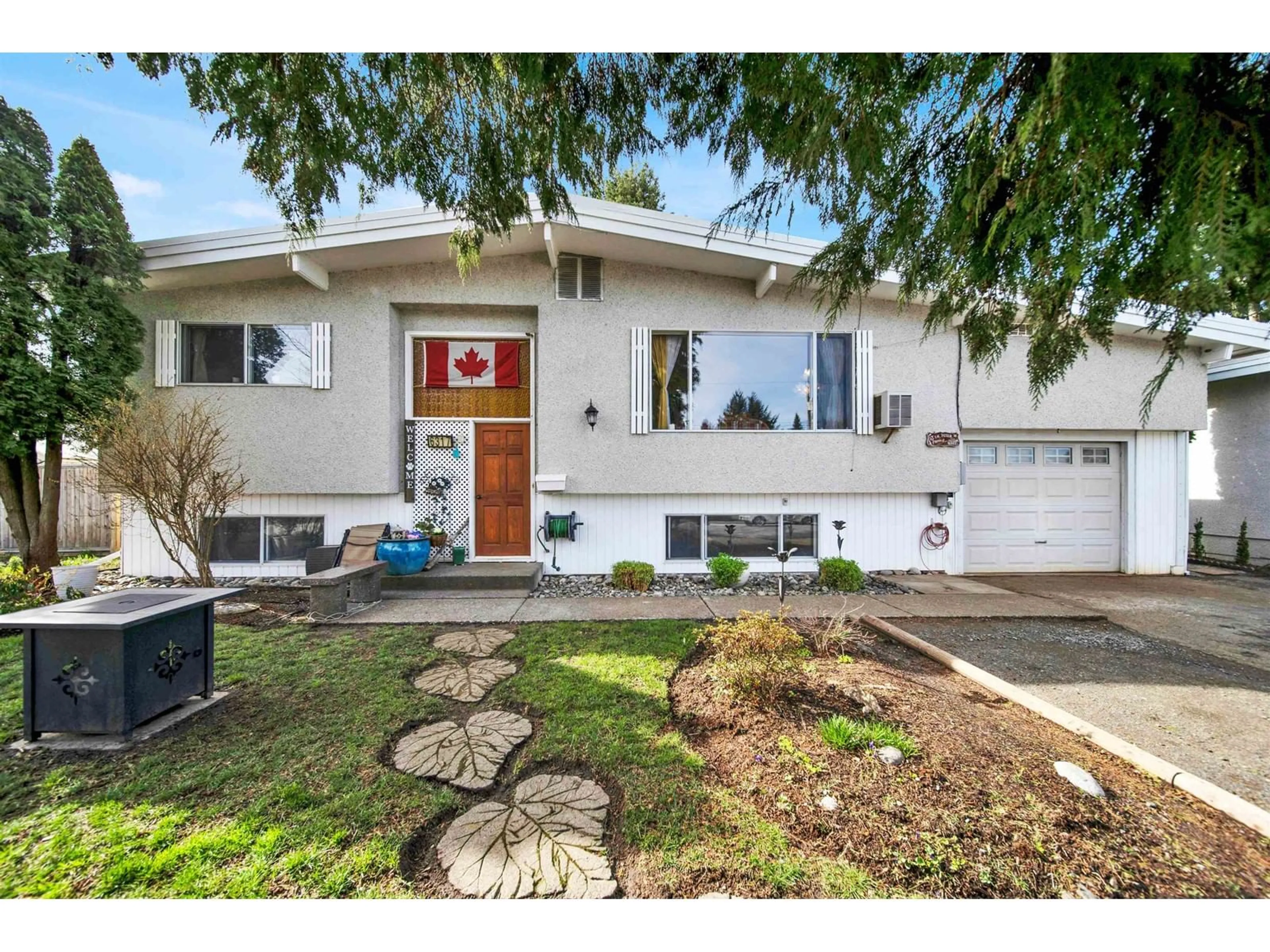 Home with vinyl exterior material, street for 6317 REID ROAD, Chilliwack British Columbia V2R2M4