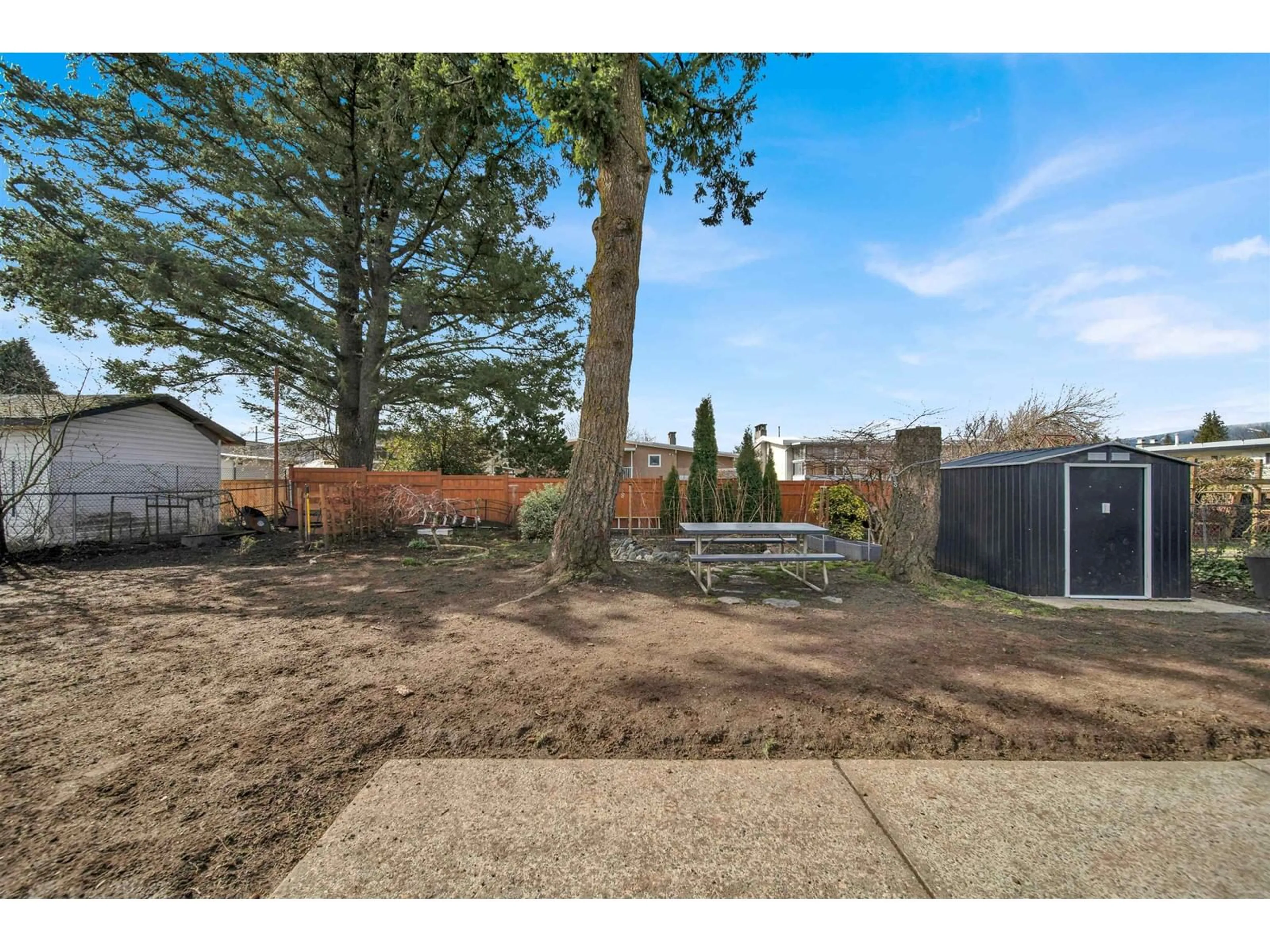 A pic from outside/outdoor area/front of a property/back of a property/a pic from drone, street for 6317 REID ROAD, Chilliwack British Columbia V2R2M4