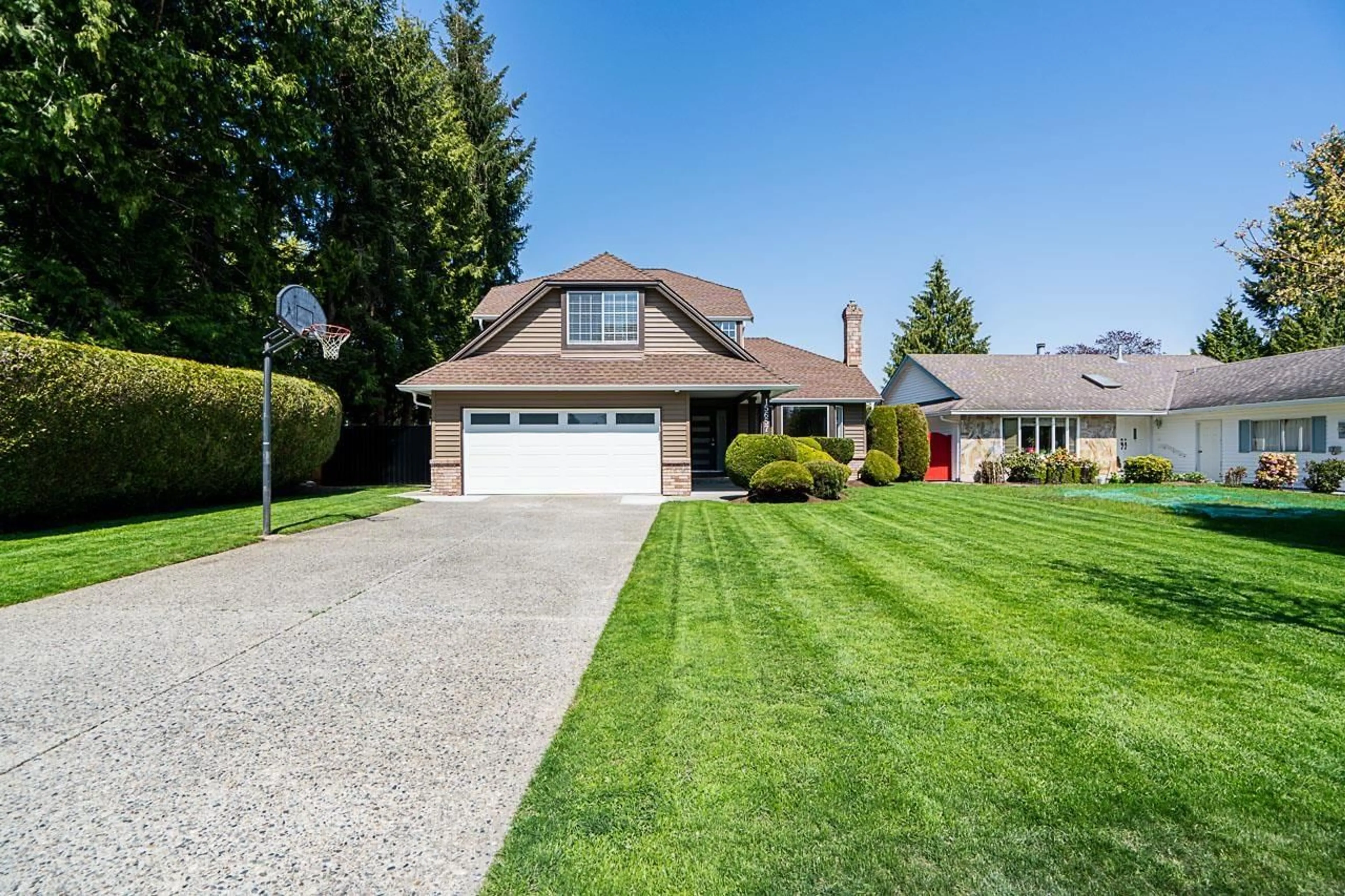 Home with vinyl exterior material, street for 15657 93, Surrey British Columbia V4N3B2