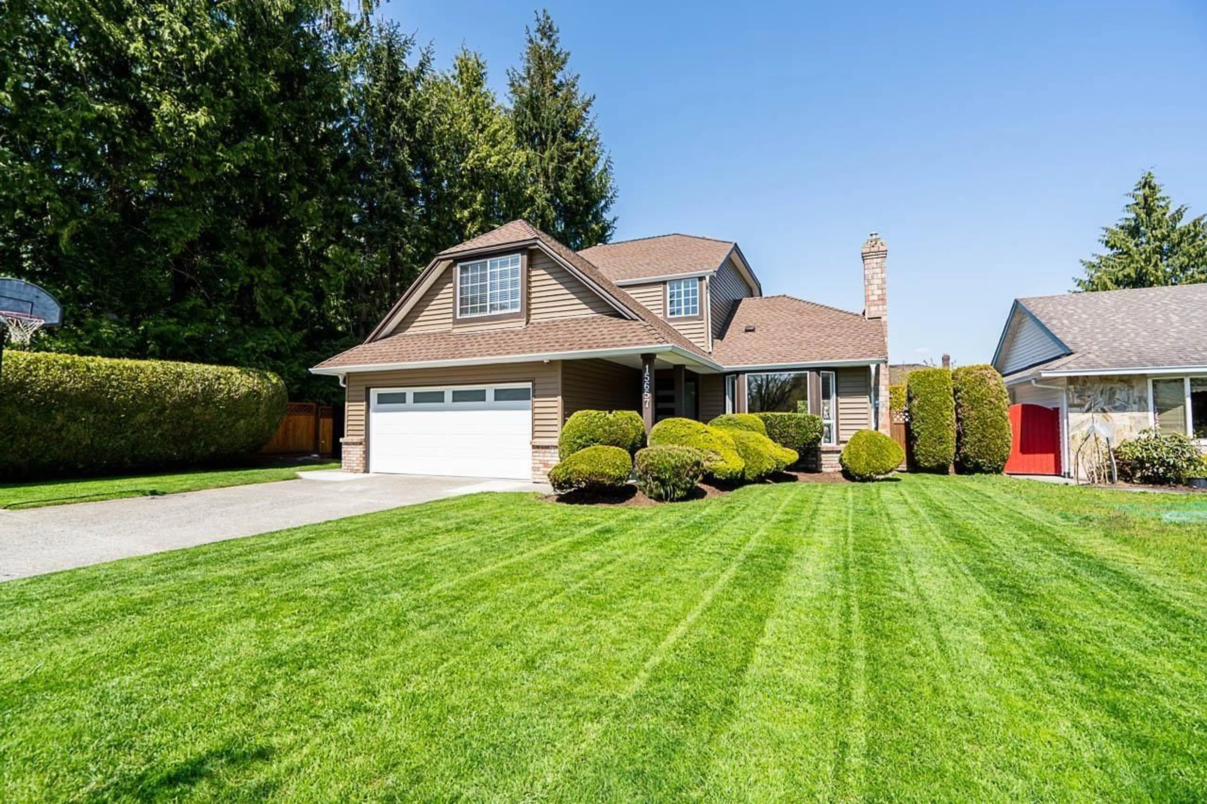 Home with vinyl exterior material, street for 15657 93, Surrey British Columbia V4N3B2