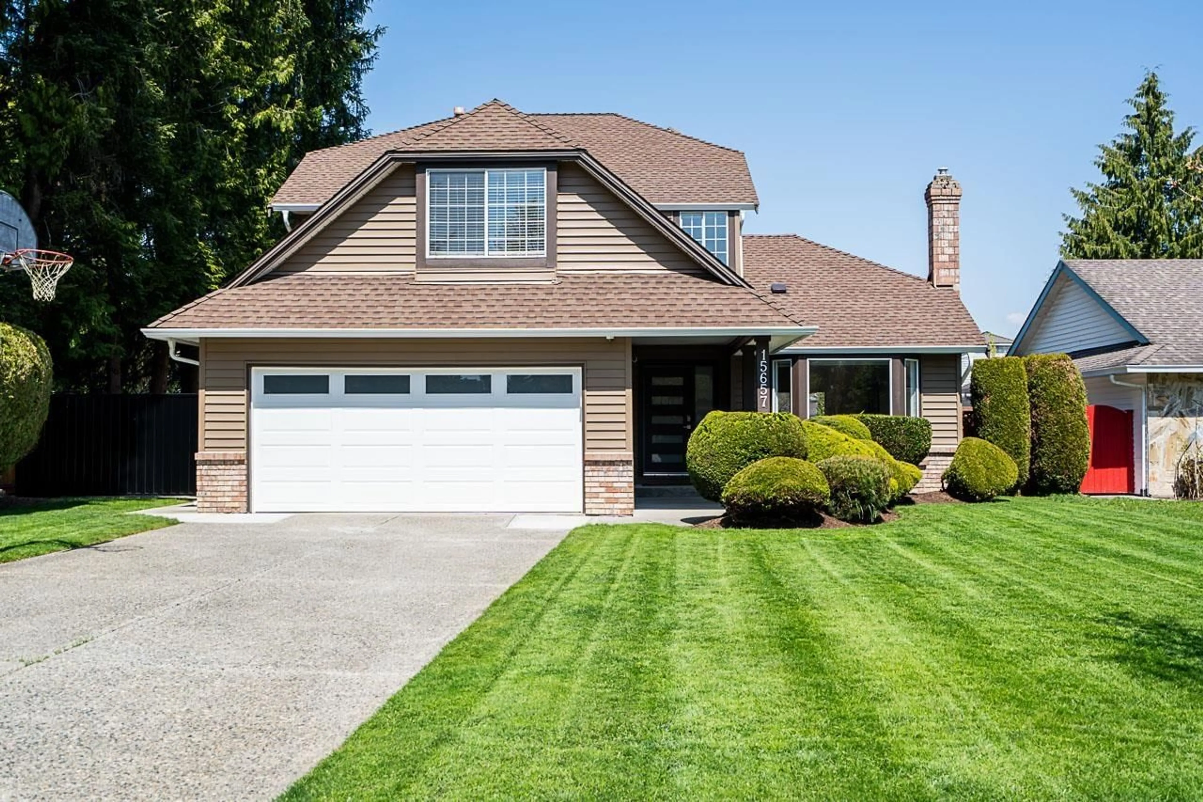 Home with vinyl exterior material, street for 15657 93, Surrey British Columbia V4N3B2