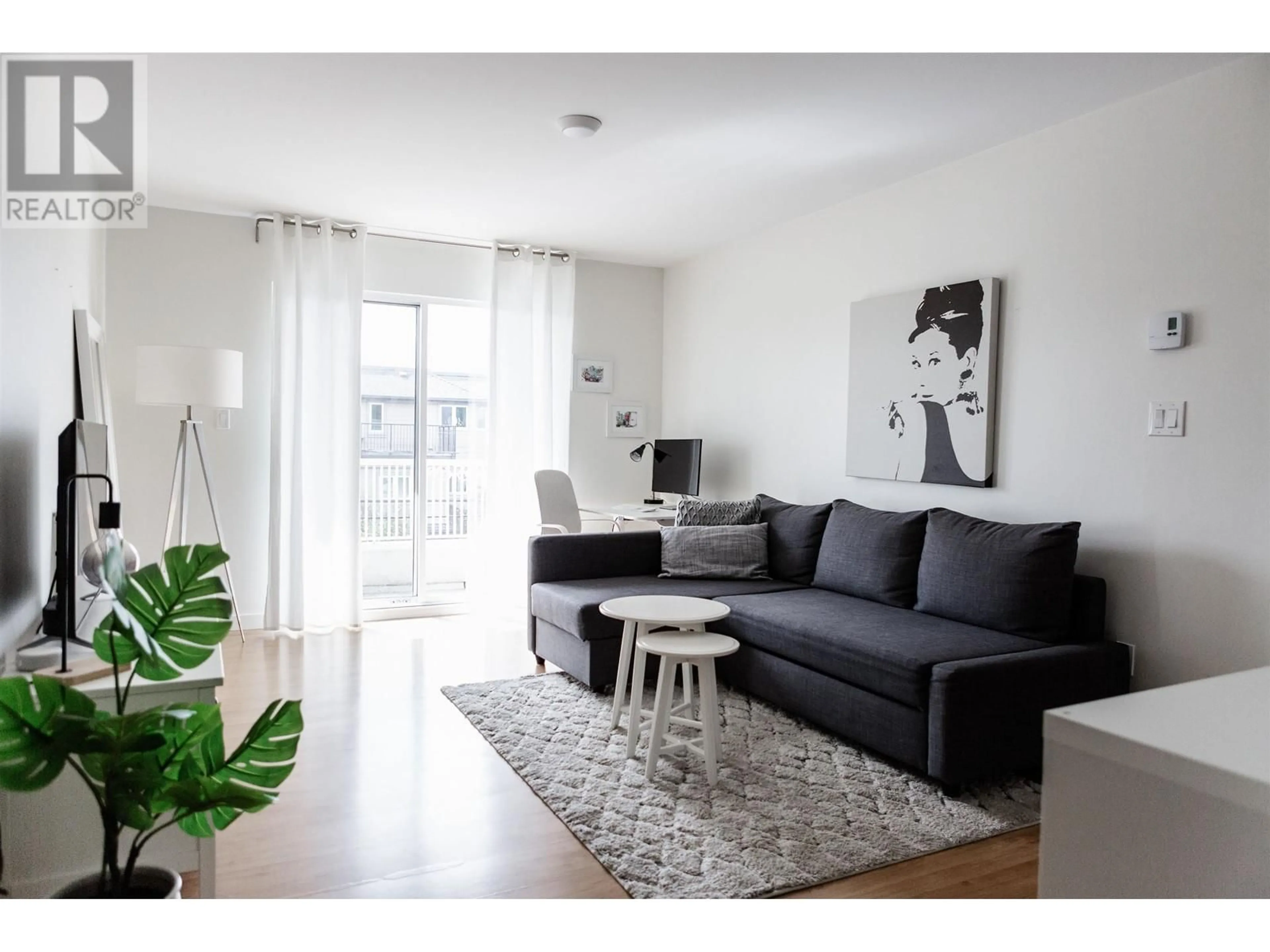 Living room with furniture, wood/laminate floor for 306 - 458 43RD AVENUE, Vancouver British Columbia V5W1T4