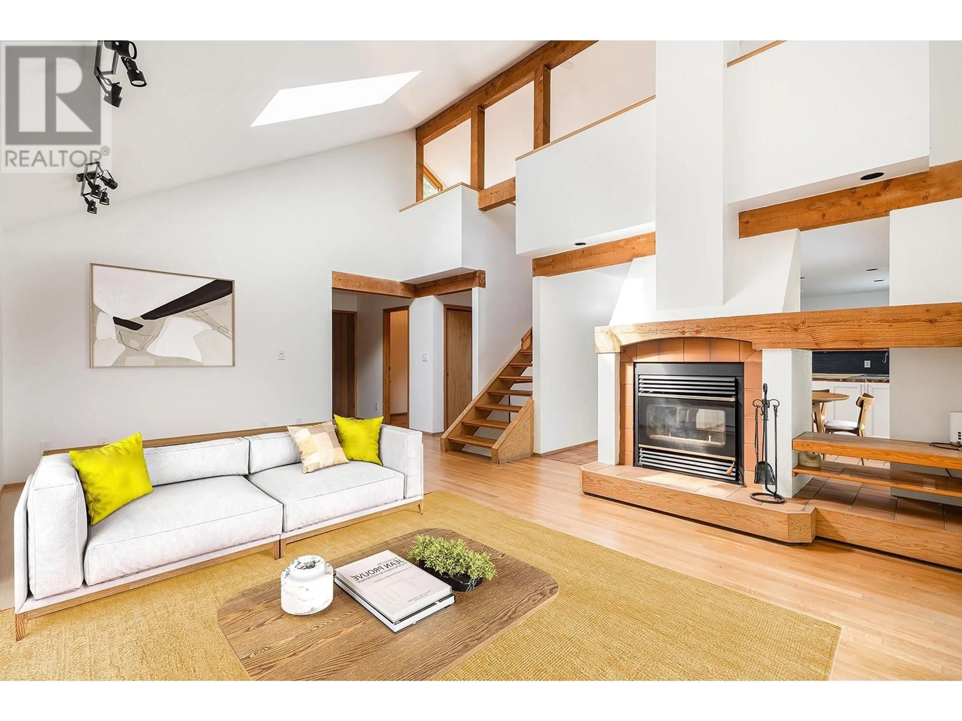 Living room with furniture, wood/laminate floor for 1311 HILLCREST ROAD, Bowen Island British Columbia V0N1G1
