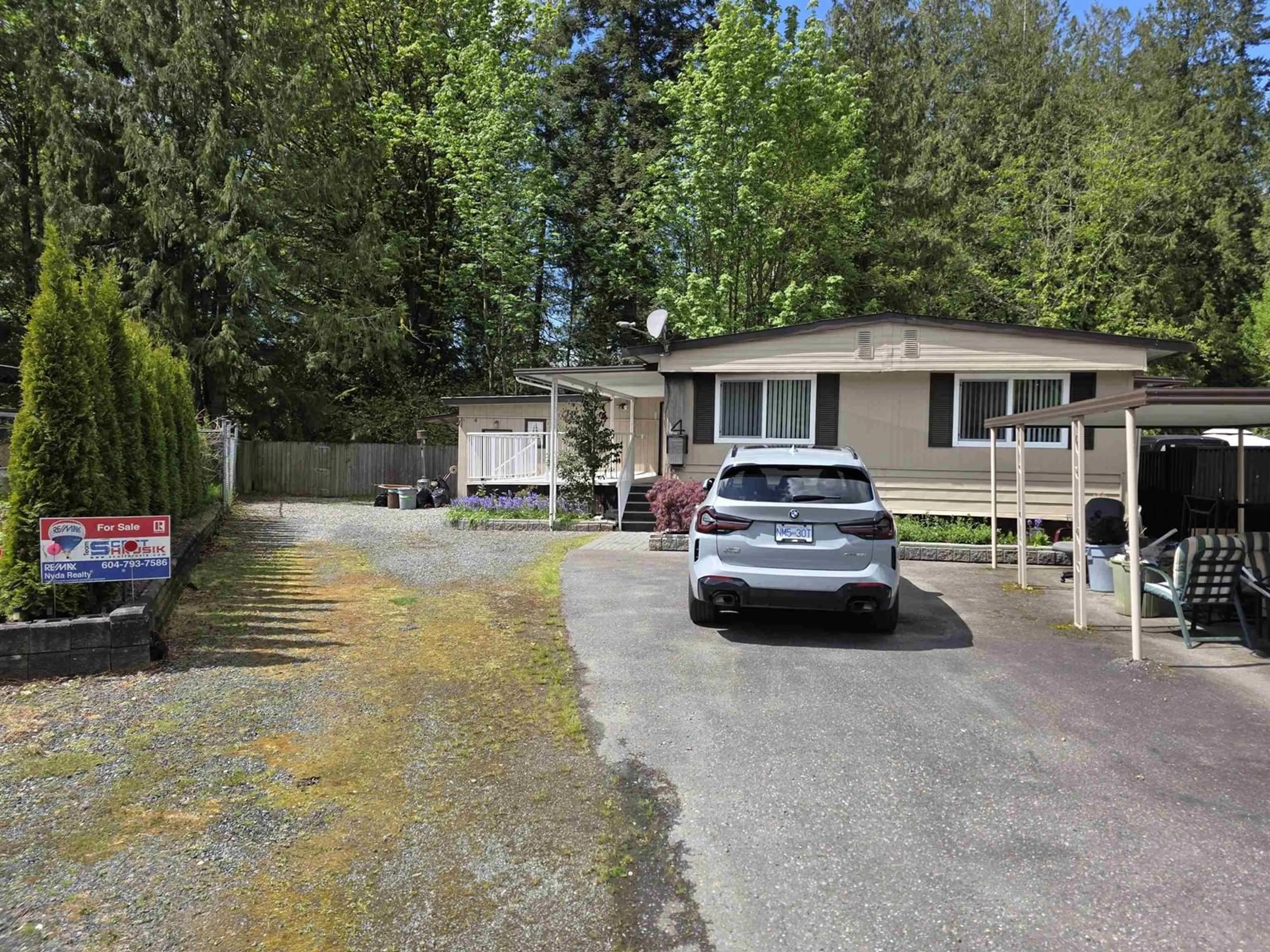A pic from outside/outdoor area/front of a property/back of a property/a pic from drone, street for 4 - 46511 CHILLIWACK LAKE ROAD, Sardis - Chwk River Valley British Columbia V2R3S2