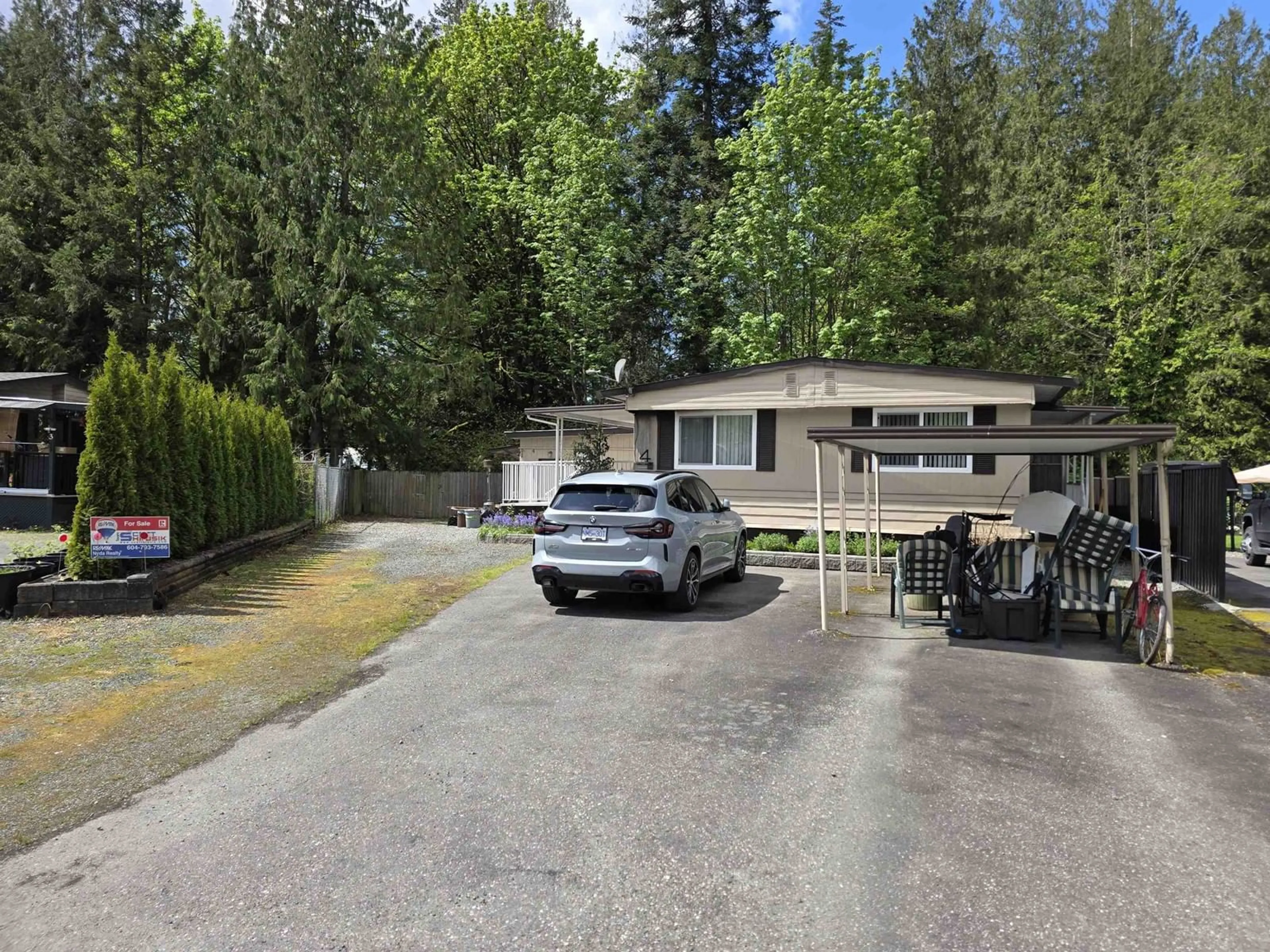 A pic from outside/outdoor area/front of a property/back of a property/a pic from drone, street for 4 - 46511 CHILLIWACK LAKE ROAD, Sardis - Chwk River Valley British Columbia V2R3S2