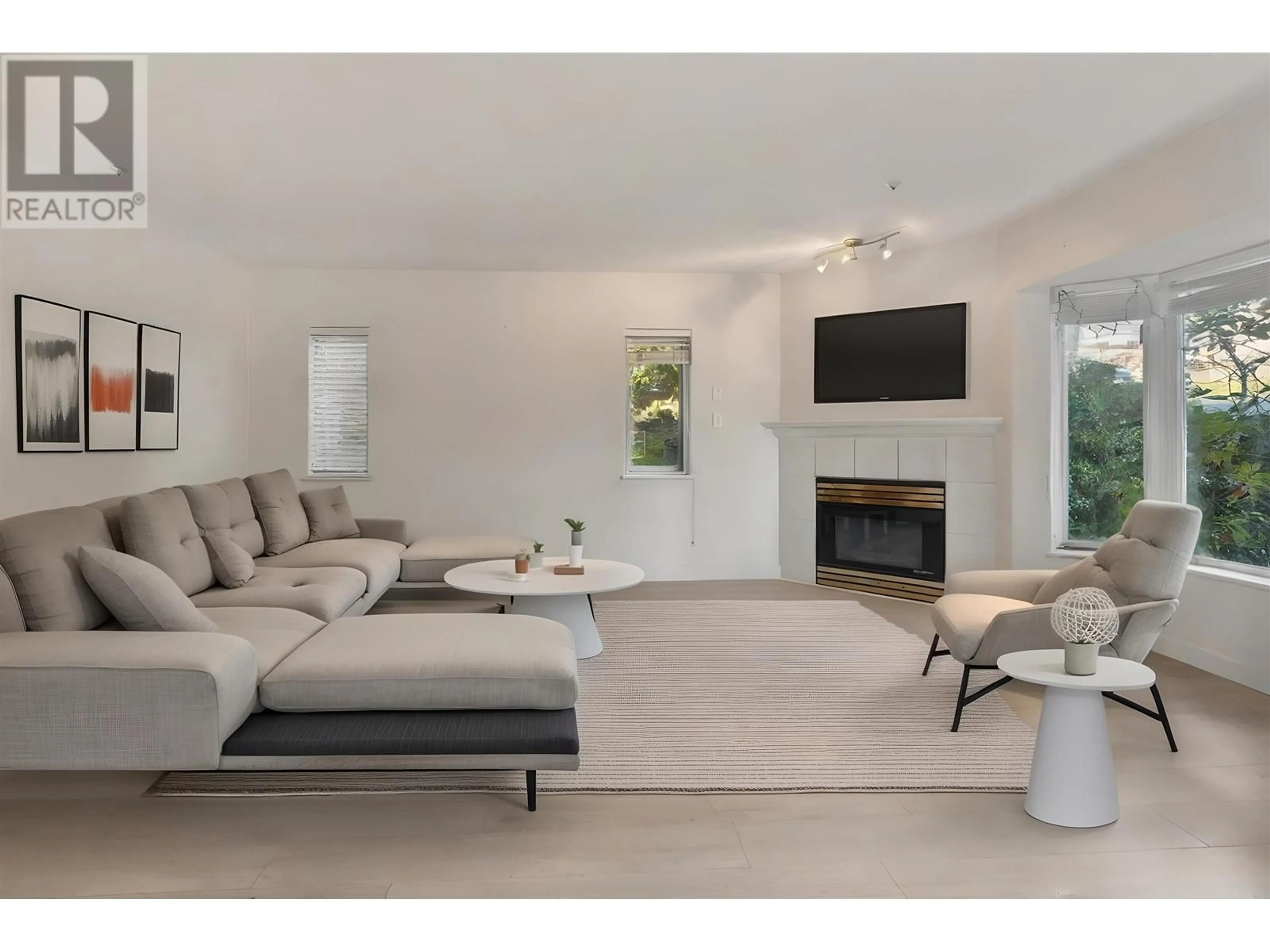 Living room with furniture, unknown for 211 - 2677 BROADWAY, Vancouver British Columbia V5M1Y6