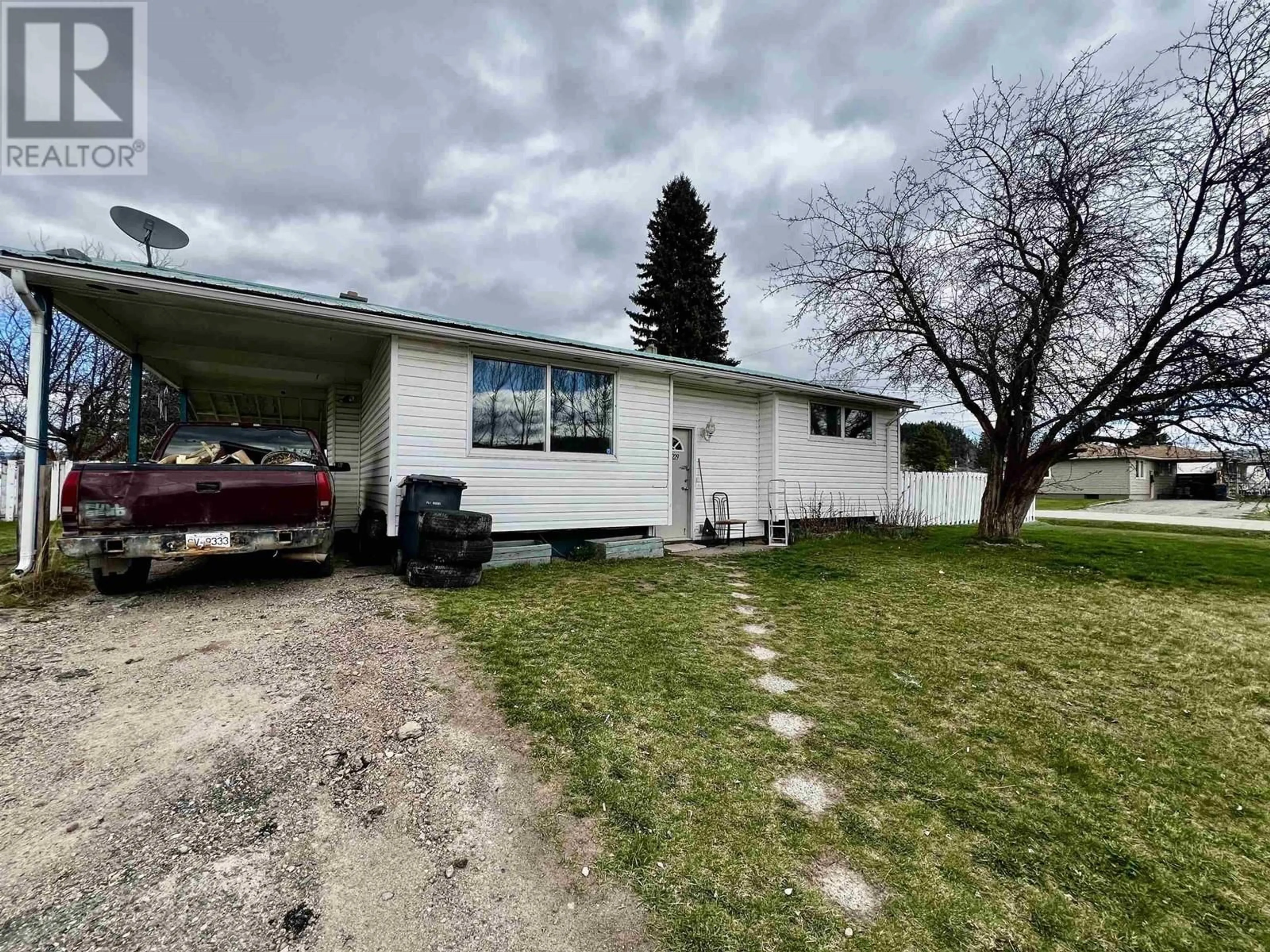 A pic from outside/outdoor area/front of a property/back of a property/a pic from drone, unknown for 229 ENDAKO AVENUE, Fraser Lake British Columbia V0J1S0