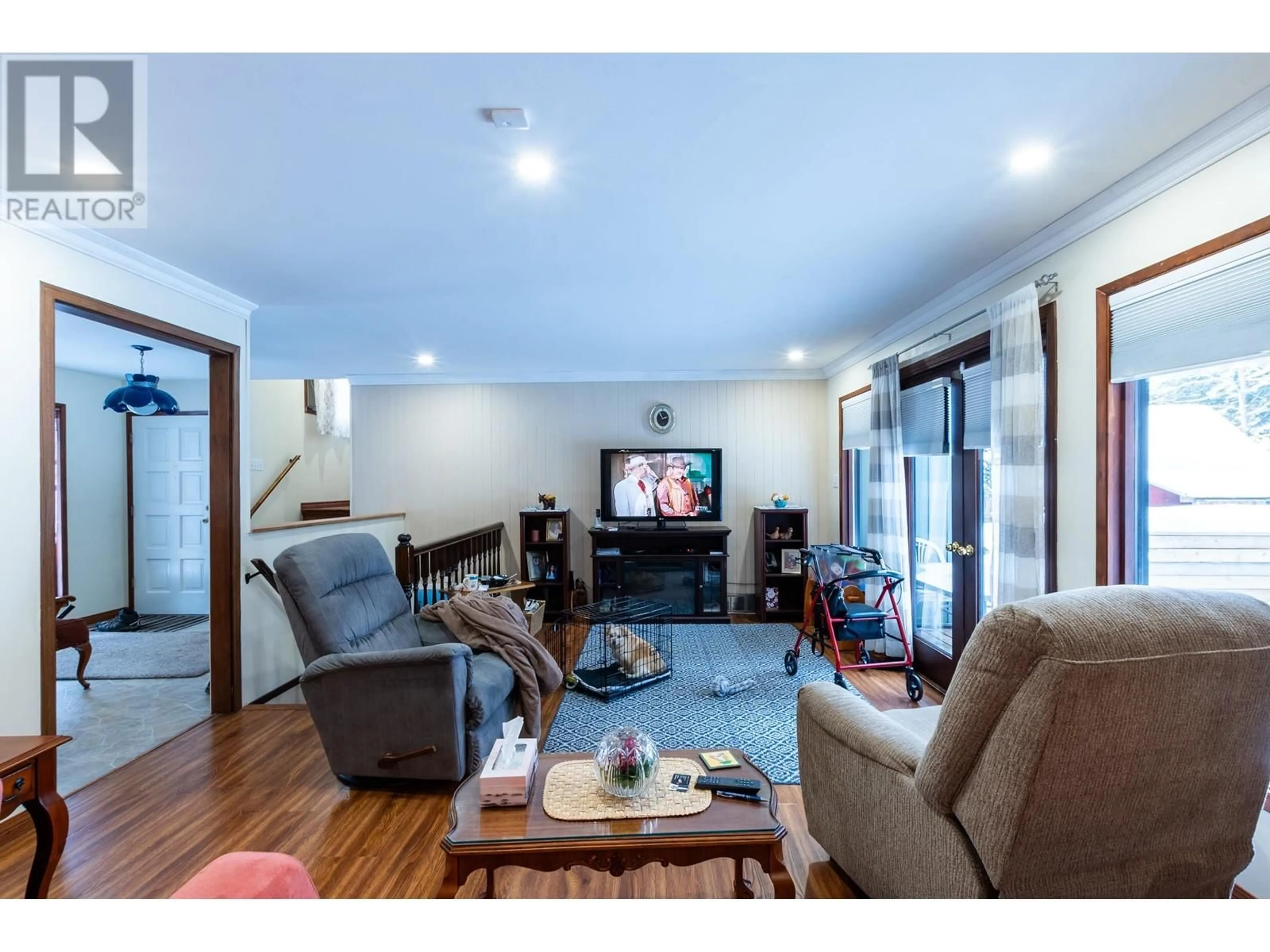 Living room with furniture, wood/laminate floor for 3611 ROSIA ROAD, Prince George British Columbia V2K4Y6