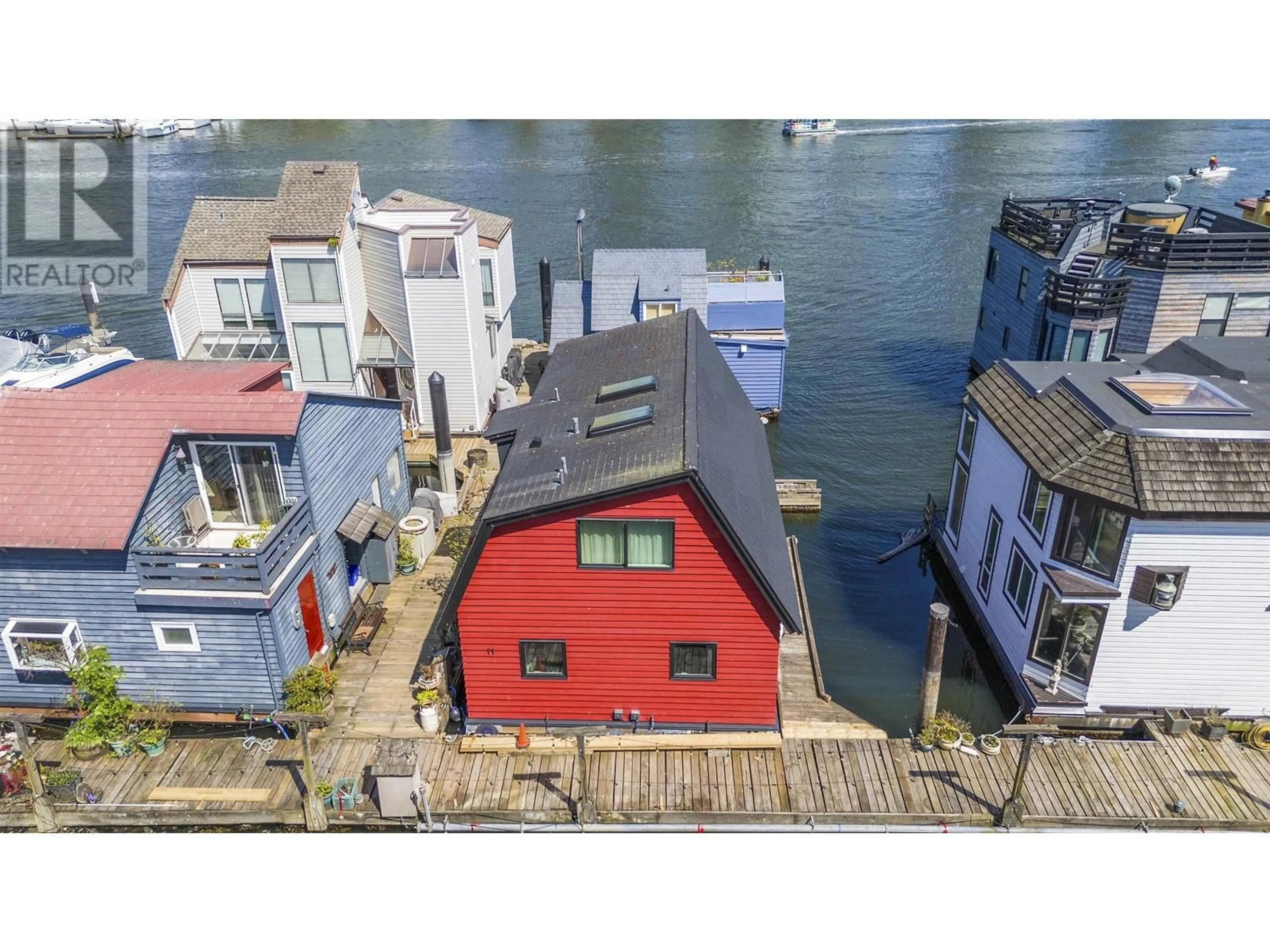 A pic from outside/outdoor area/front of a property/back of a property/a pic from drone, water/lake/river/ocean view for 11 - 1301 JOHNSTON STREET, Vancouver British Columbia V6H3R9