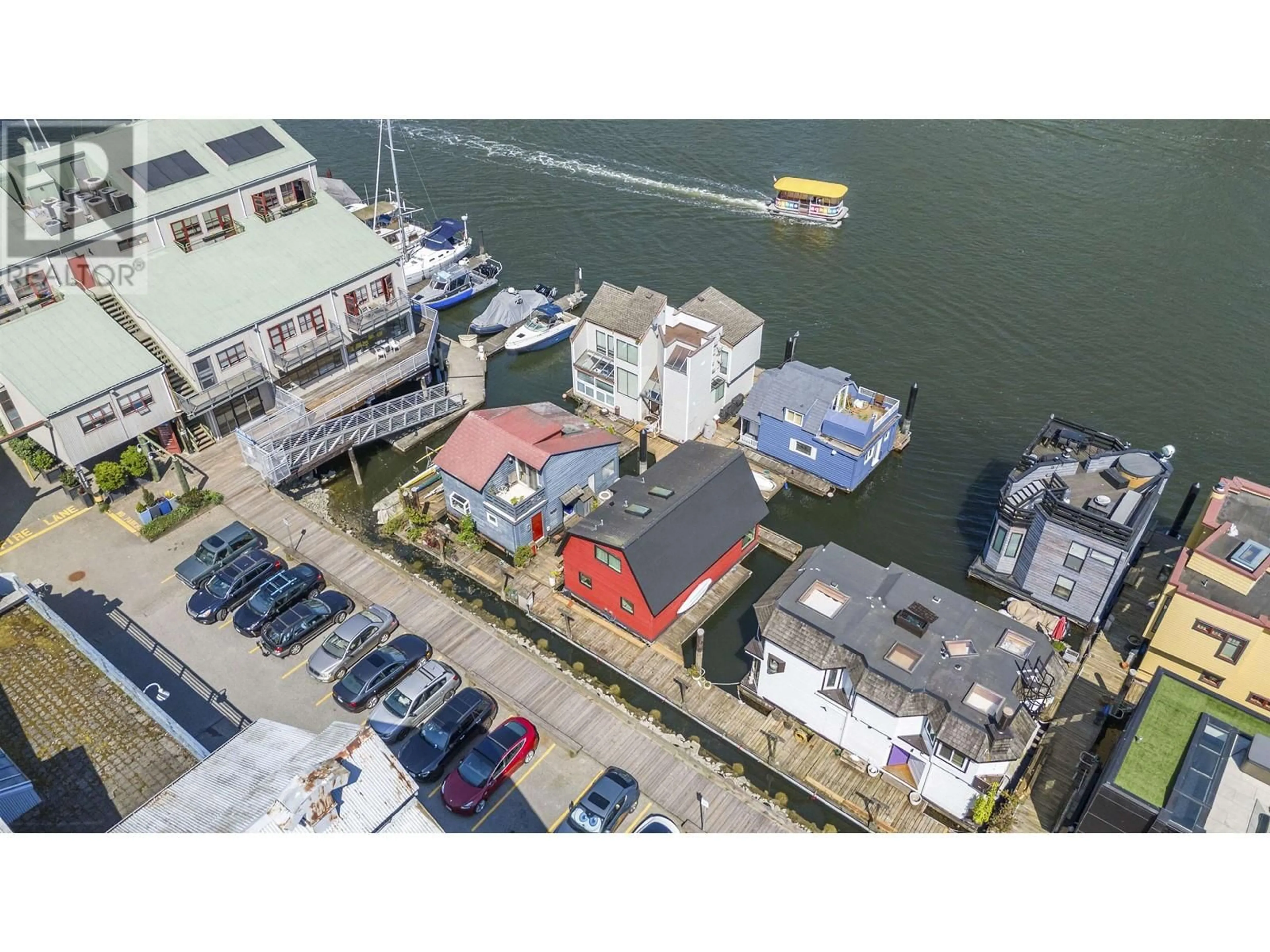 A pic from outside/outdoor area/front of a property/back of a property/a pic from drone, water/lake/river/ocean view for 11 - 1301 JOHNSTON STREET, Vancouver British Columbia V6H3R9