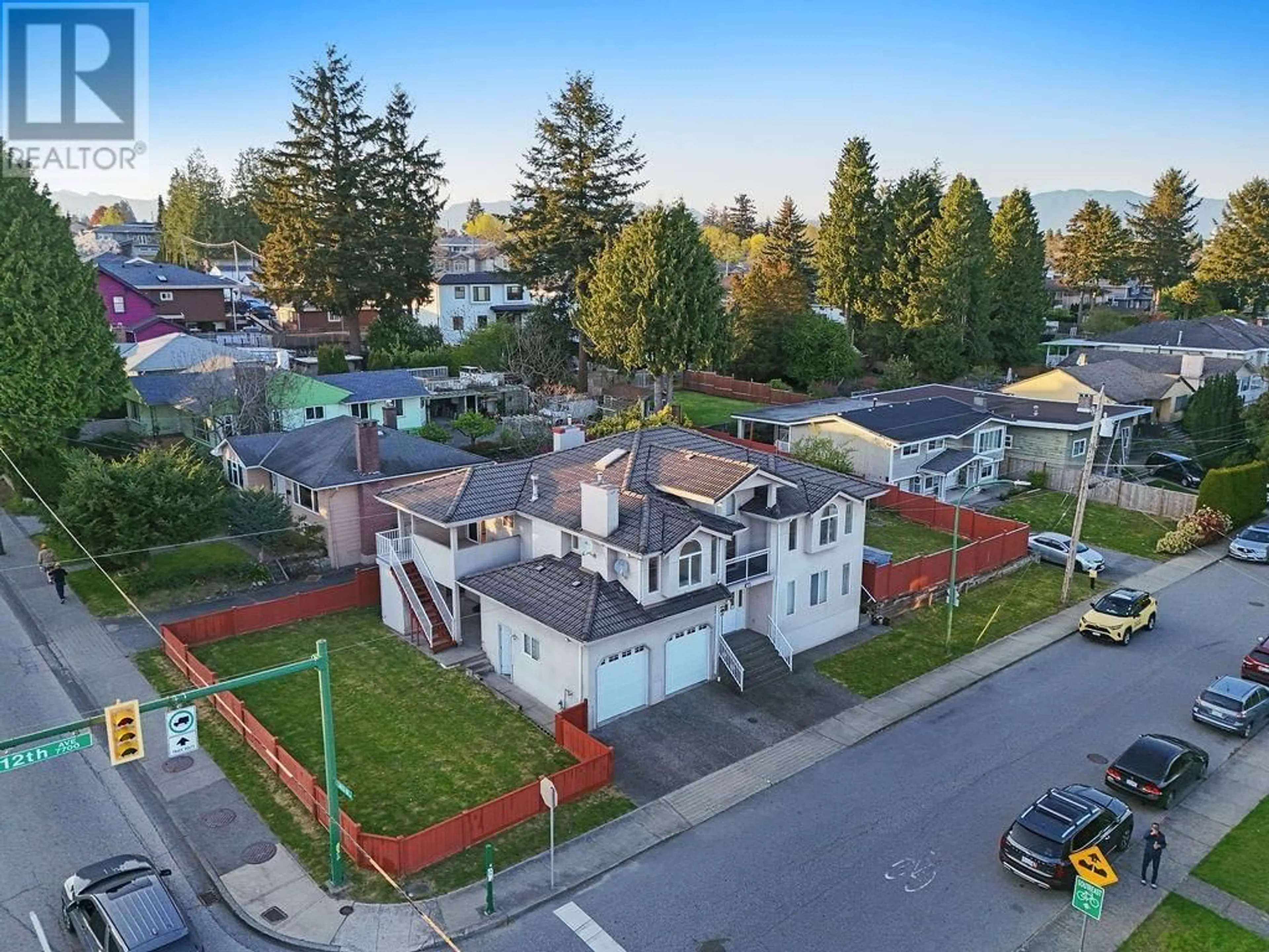 A pic from outside/outdoor area/front of a property/back of a property/a pic from drone, street for 7707 12TH AVENUE, Burnaby British Columbia V3N2K6