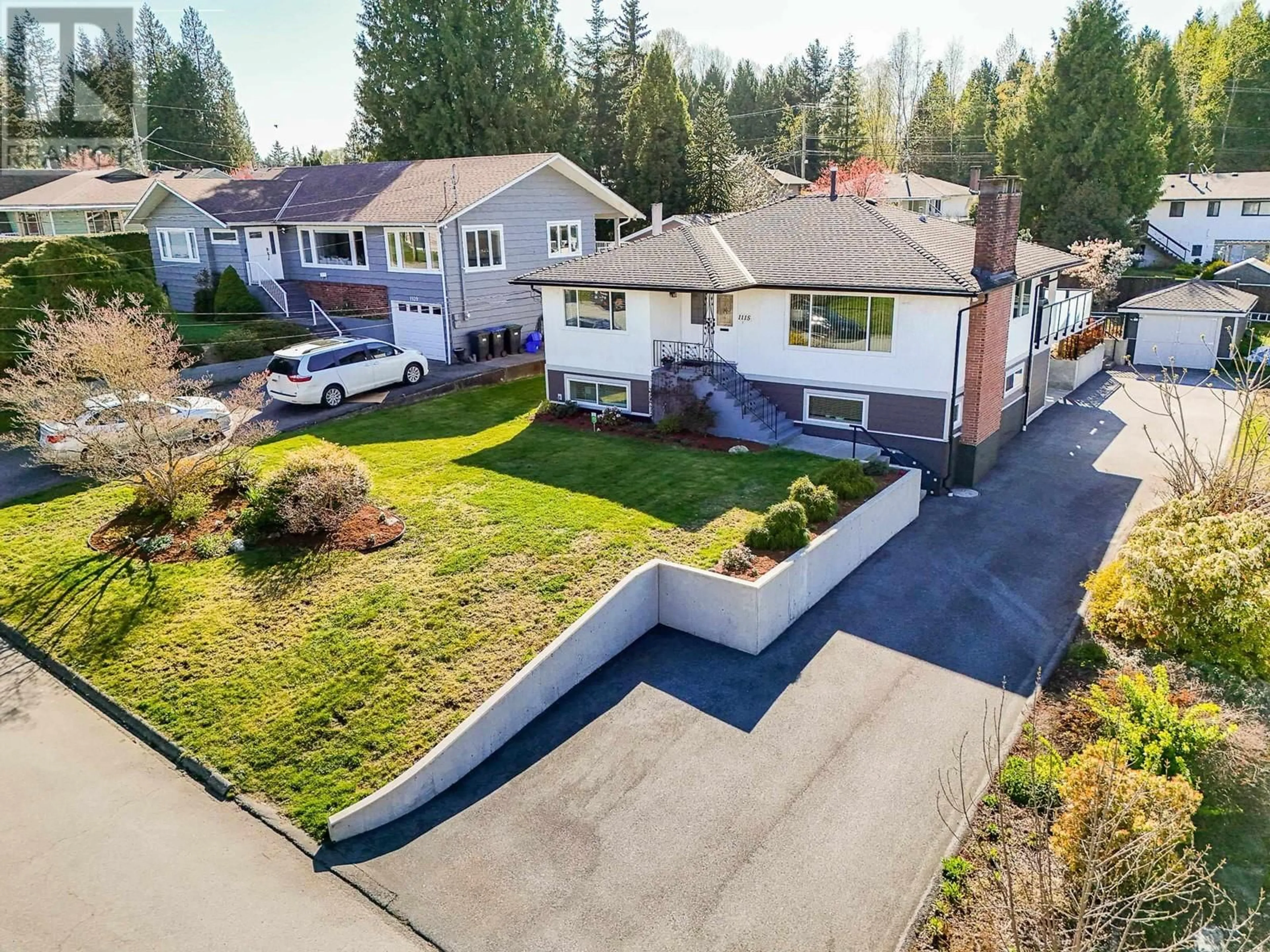 A pic from outside/outdoor area/front of a property/back of a property/a pic from drone, street for 1115 VICTORY DRIVE, Port Moody British Columbia V3H1K3