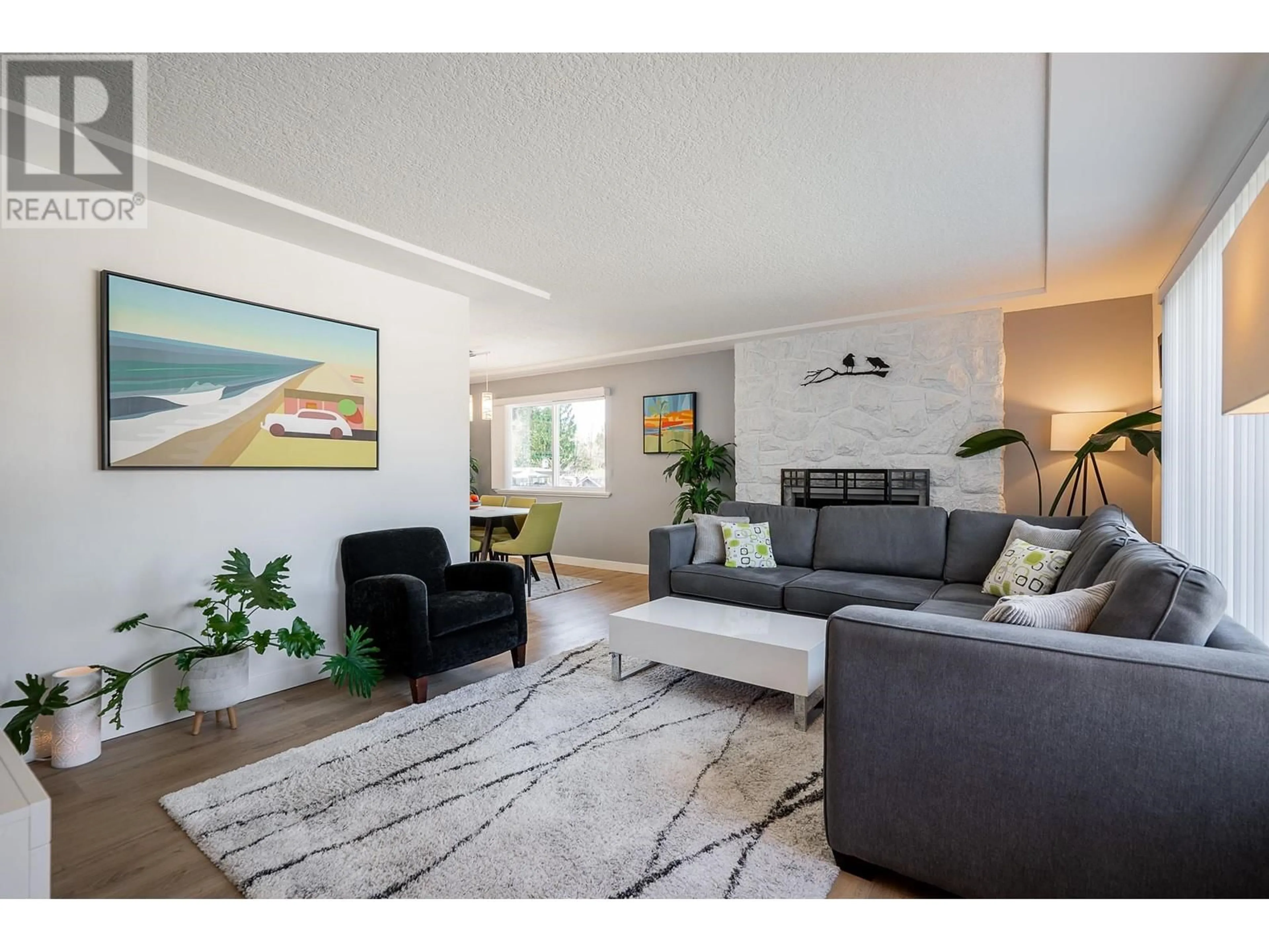 Living room with furniture, wood/laminate floor for 1115 VICTORY DRIVE, Port Moody British Columbia V3H1K3