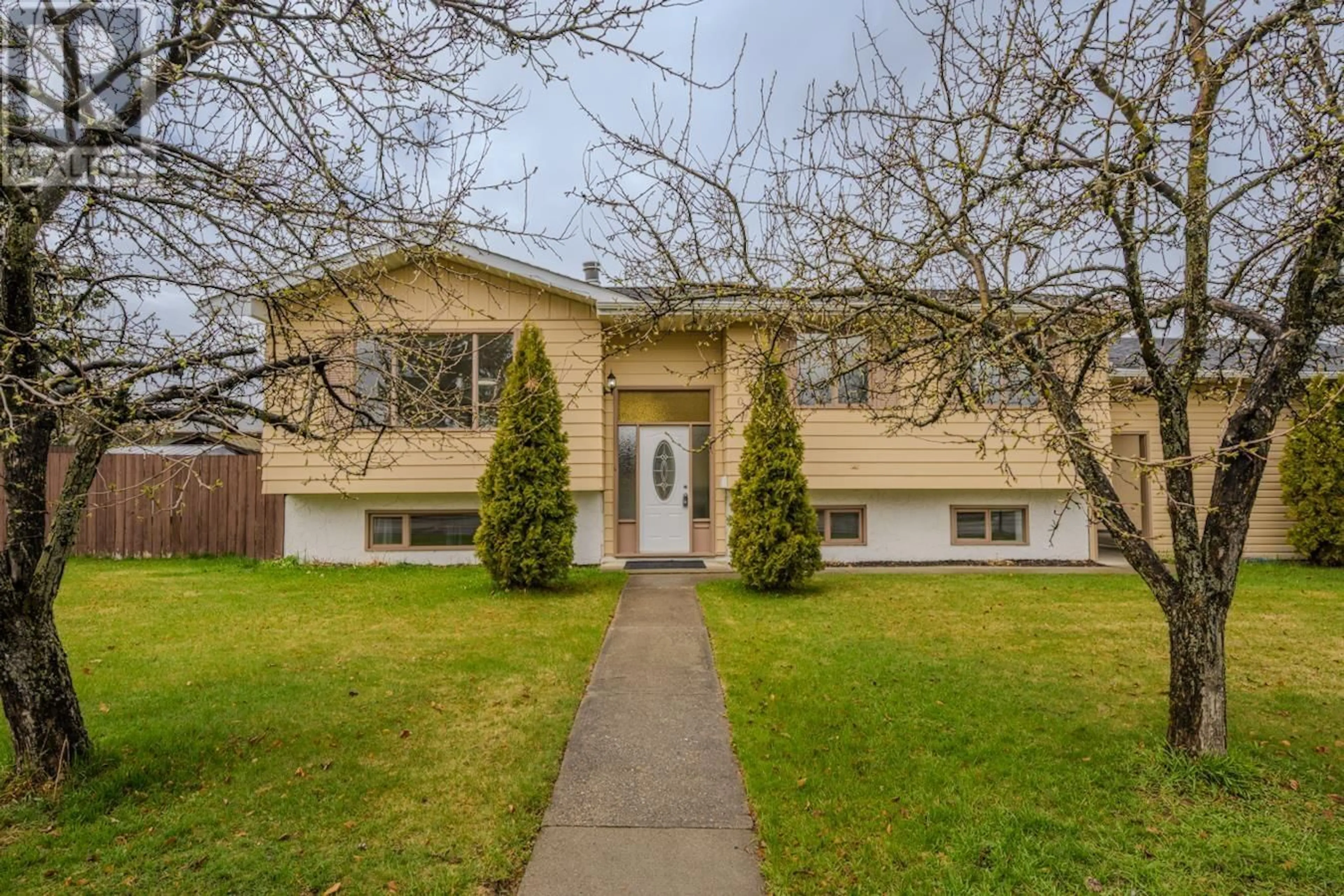 Home with vinyl exterior material, street for 309 TABOR BOULEVARD, Prince George British Columbia V2M5Z3
