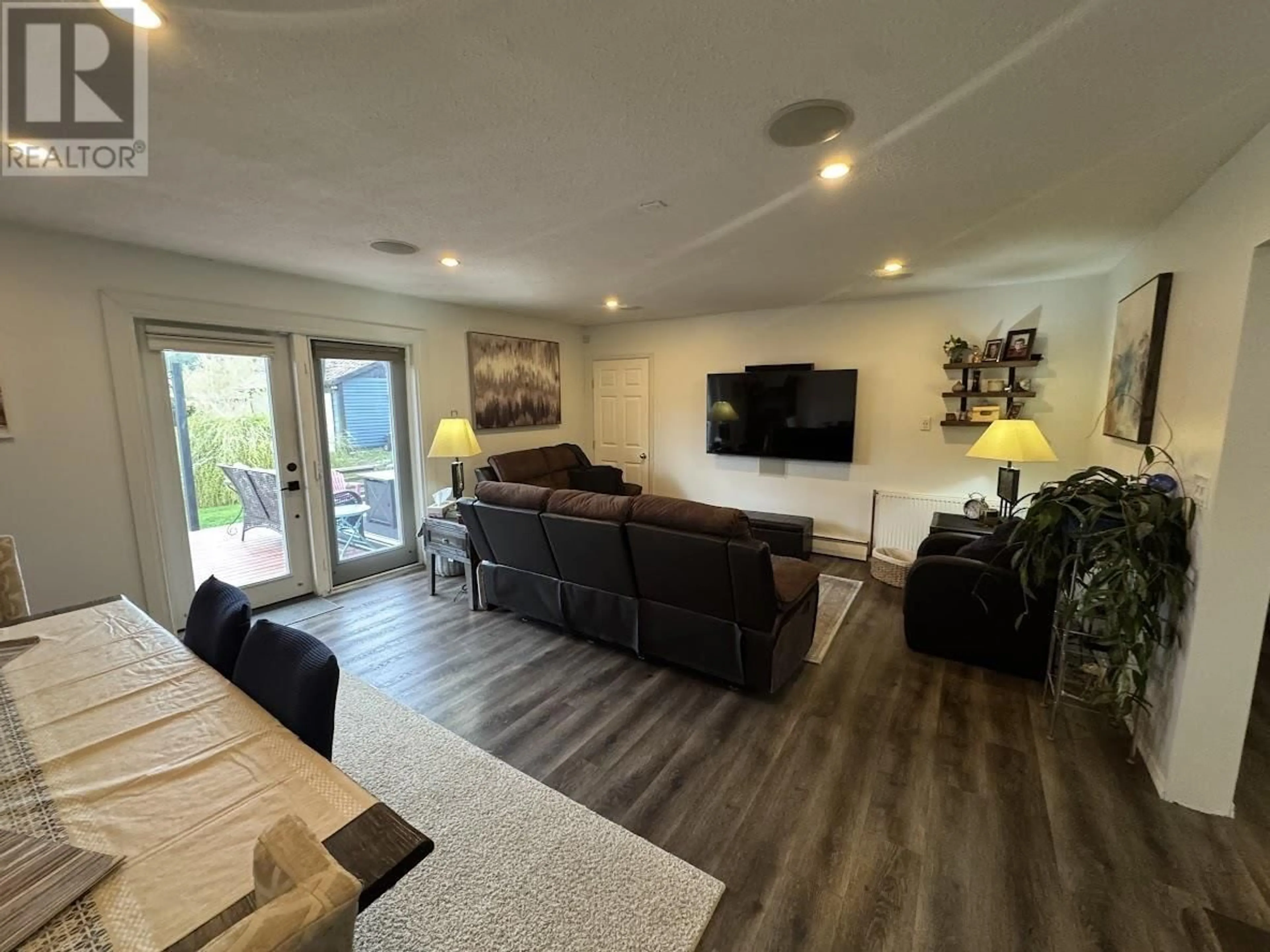 Living room with furniture, wood/laminate floor for 2018 MACKENZIE AVENUE, Williams Lake British Columbia V2G1P3