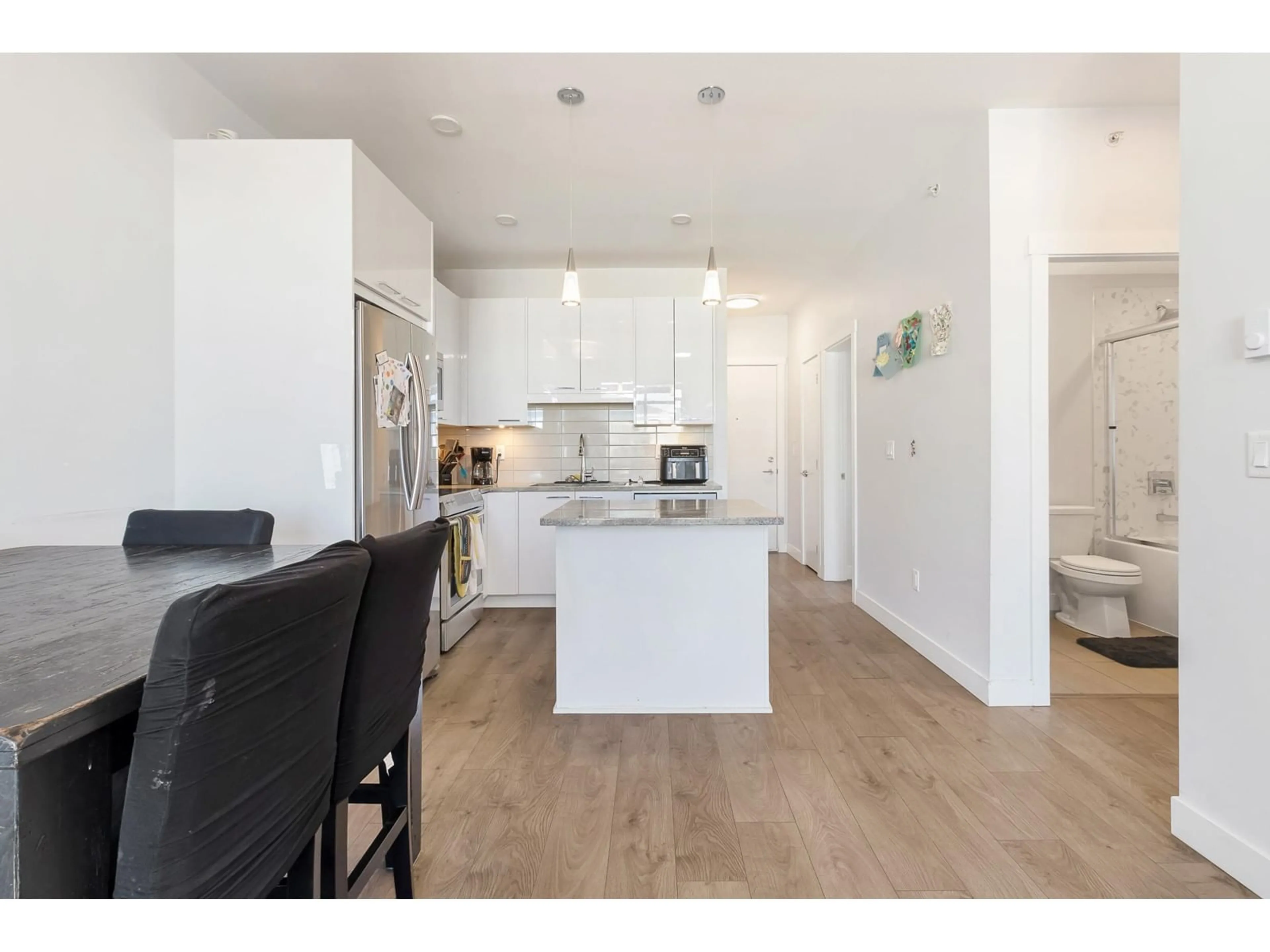 Open concept kitchen, wood/laminate floor for 512 - 20696 EASTLEIGH, Langley British Columbia V3A0M3