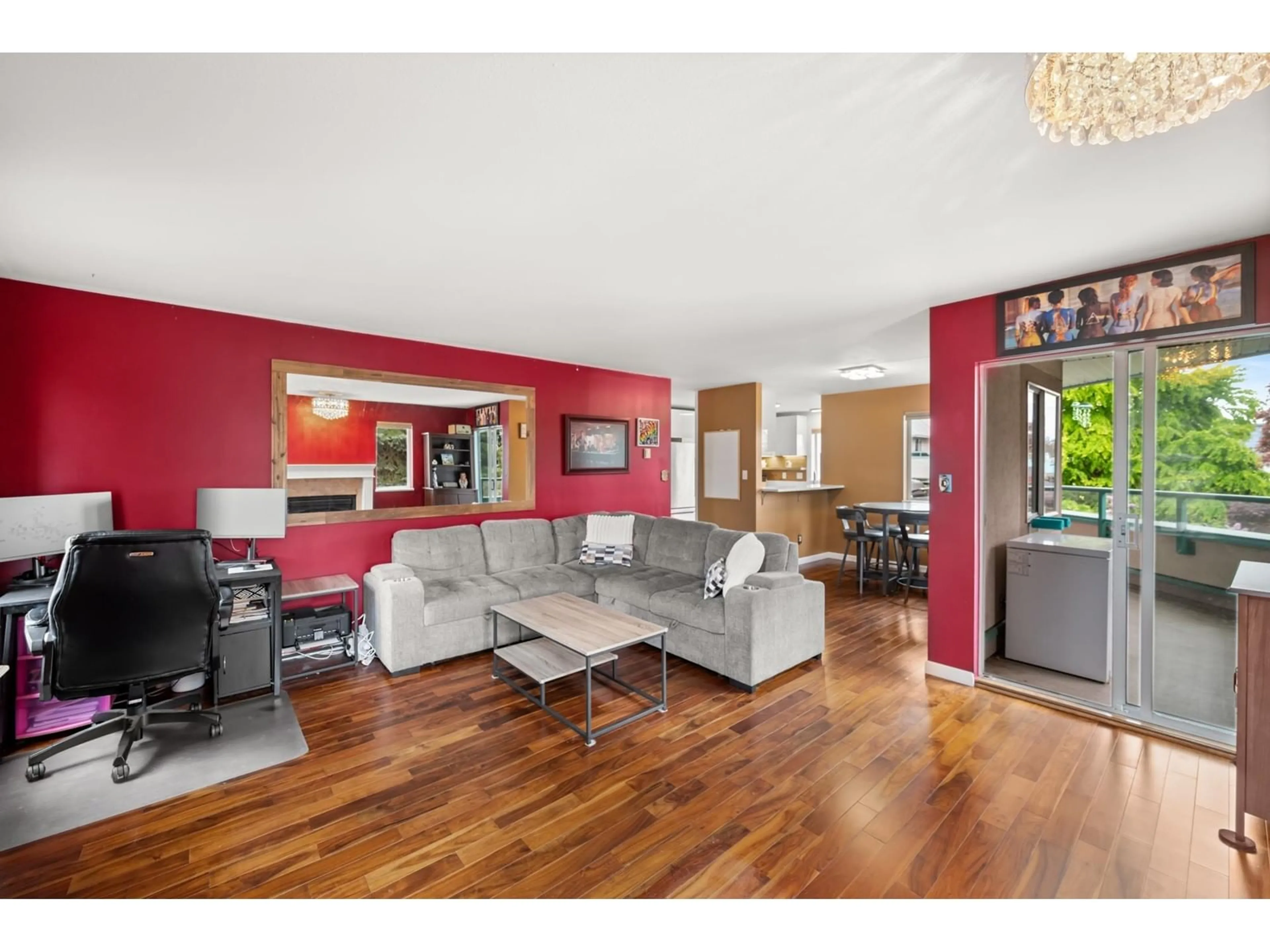 Living room with furniture, wood/laminate floor for 203 - 33165 OLD YALE, Abbotsford British Columbia V2S2J4