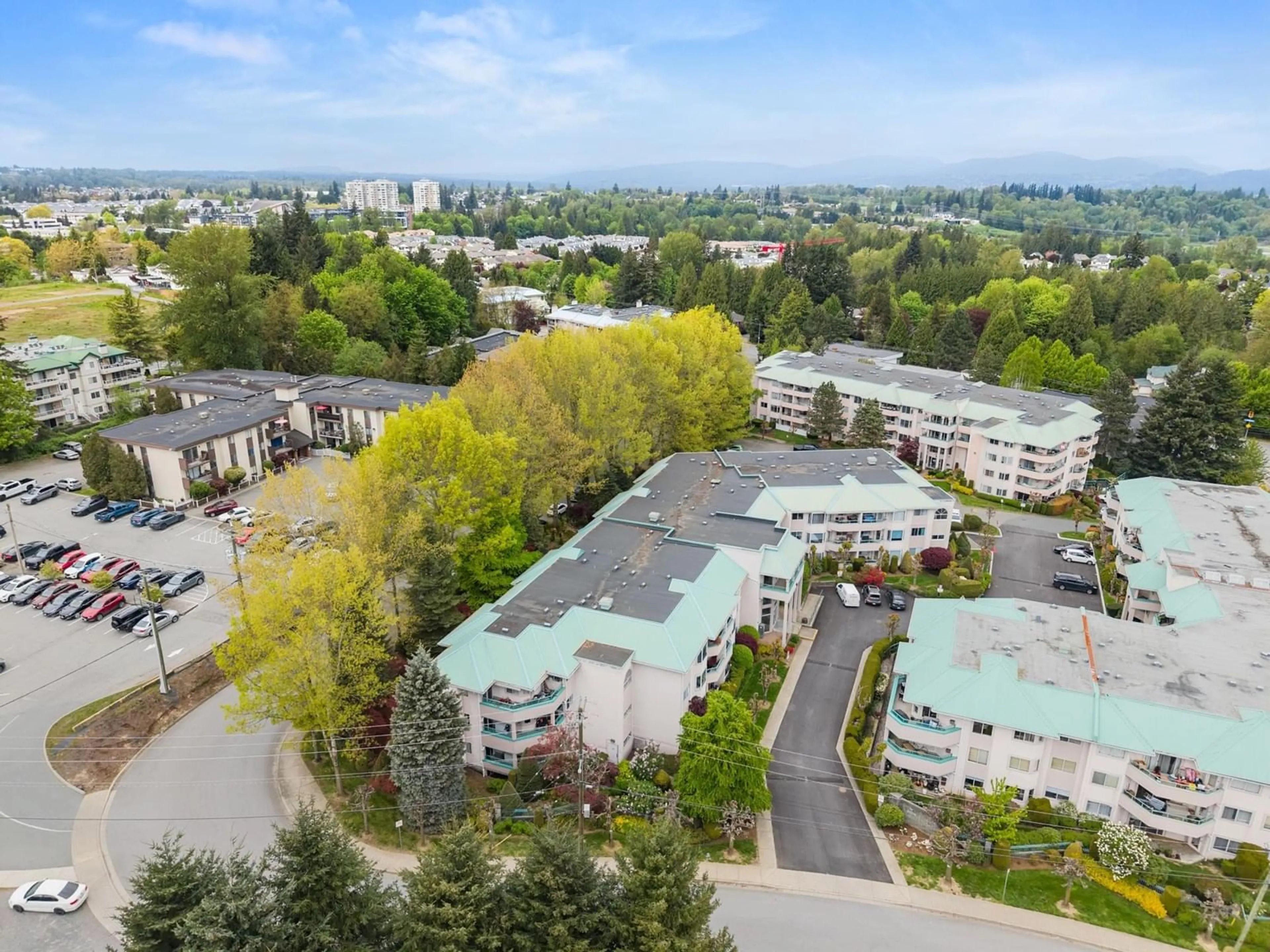 A pic from outside/outdoor area/front of a property/back of a property/a pic from drone, city buildings view from balcony for 203 - 33165 OLD YALE, Abbotsford British Columbia V2S2J4