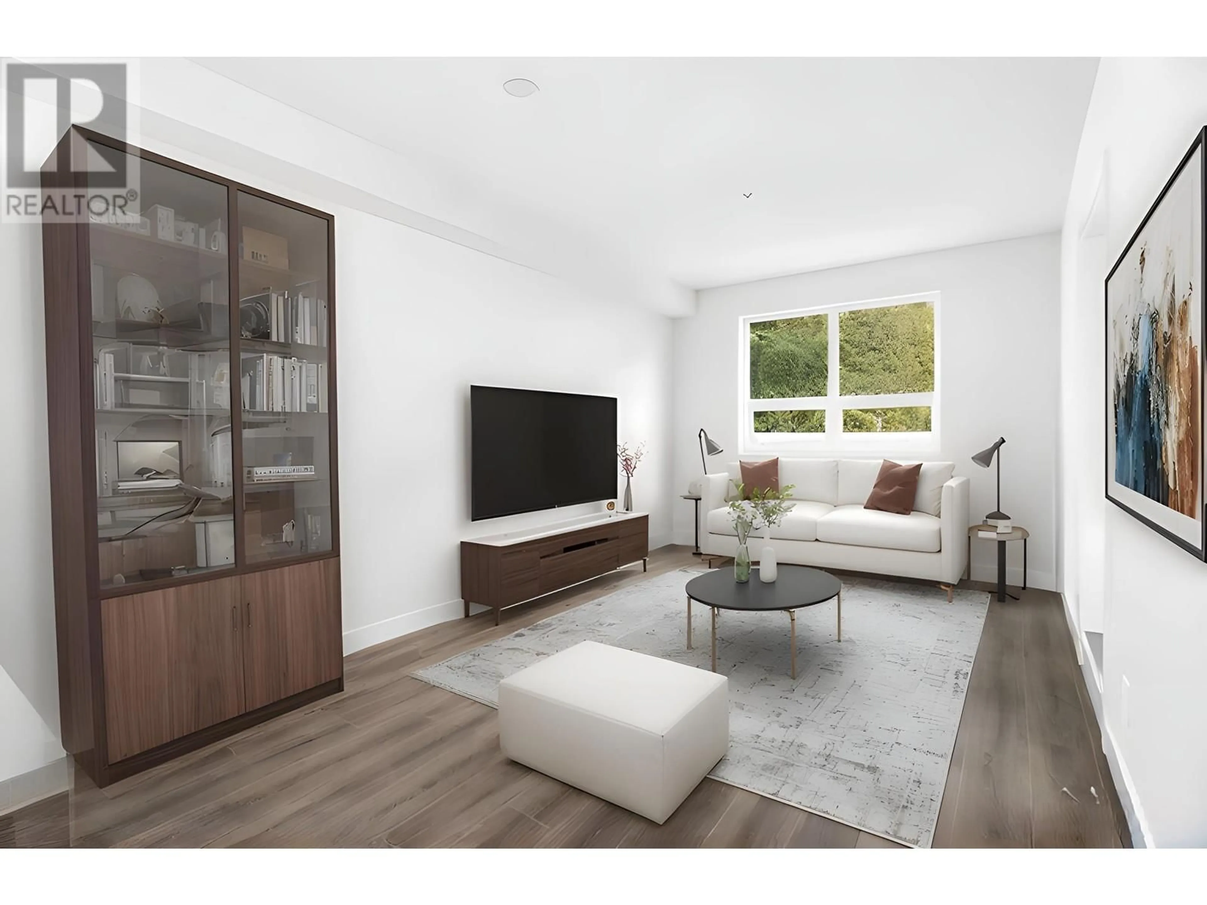Living room with furniture, wood/laminate floor for 309 - 5535 HASTINGS STREET, Burnaby British Columbia V5B1R2