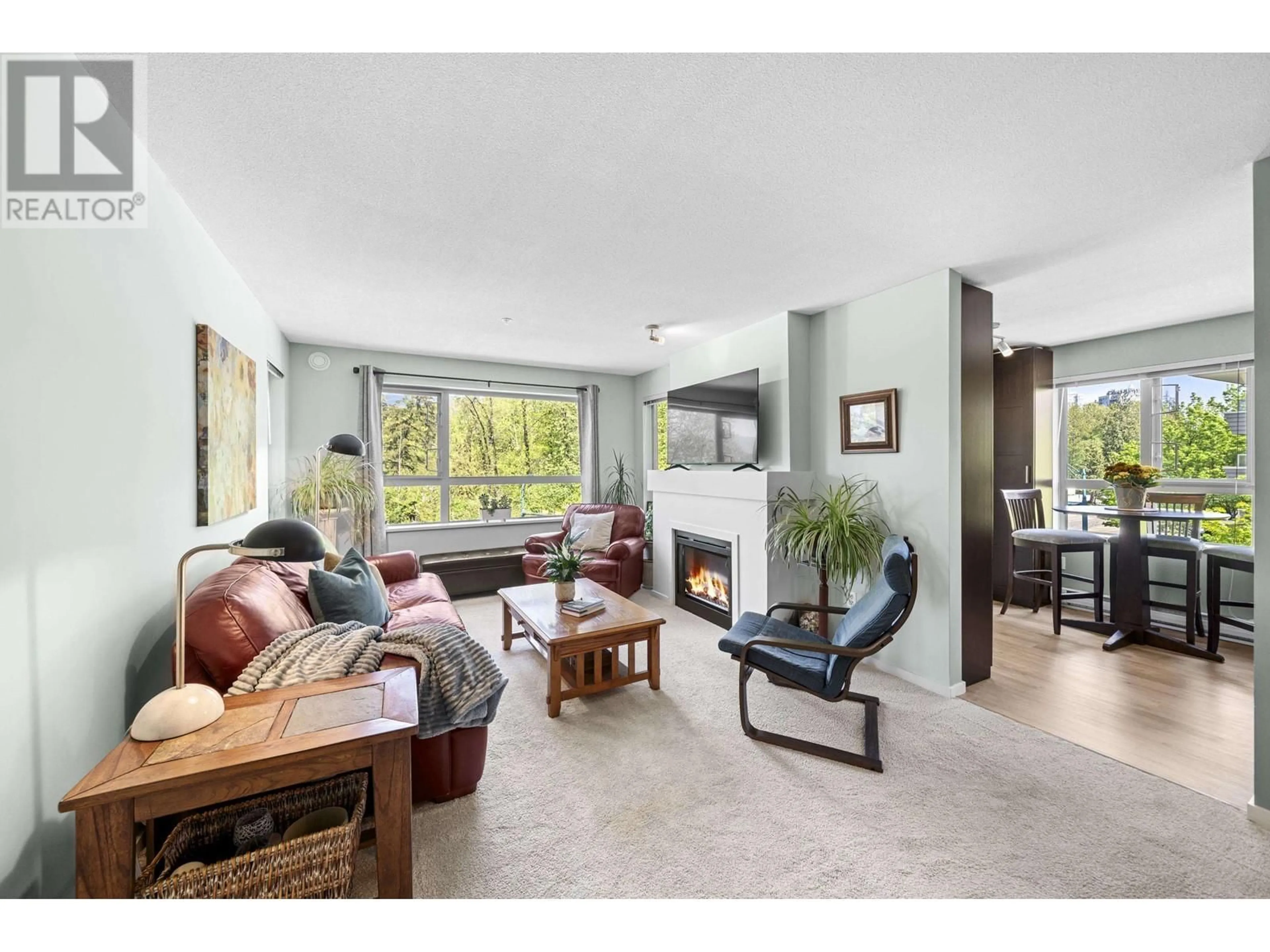 Living room with furniture, unknown for 306 - 700 KLAHANIE DRIVE, Port Moody British Columbia V3H5L3
