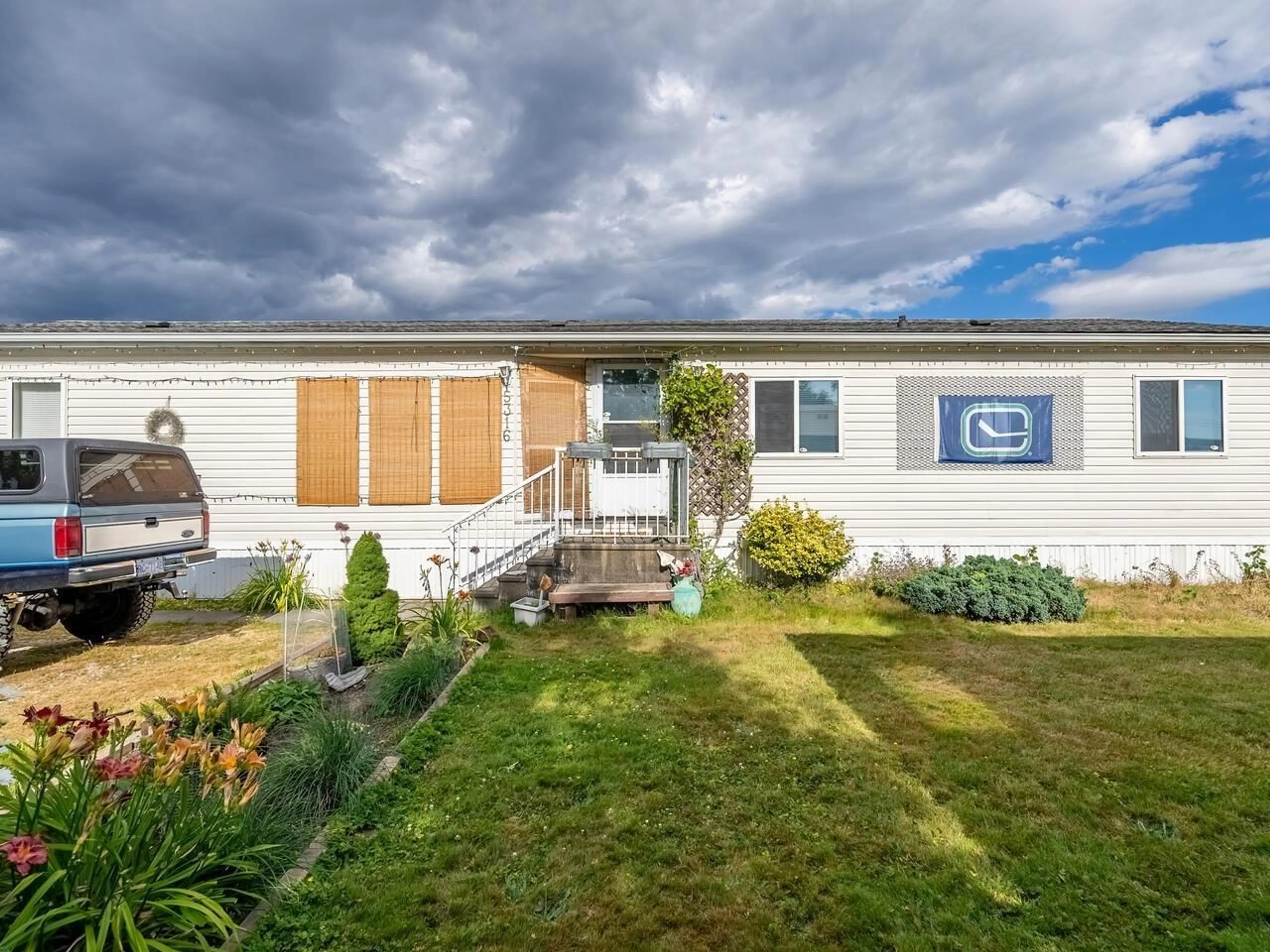 Home with vinyl exterior material, street for 5316 216, Langley British Columbia V2Y1Y2