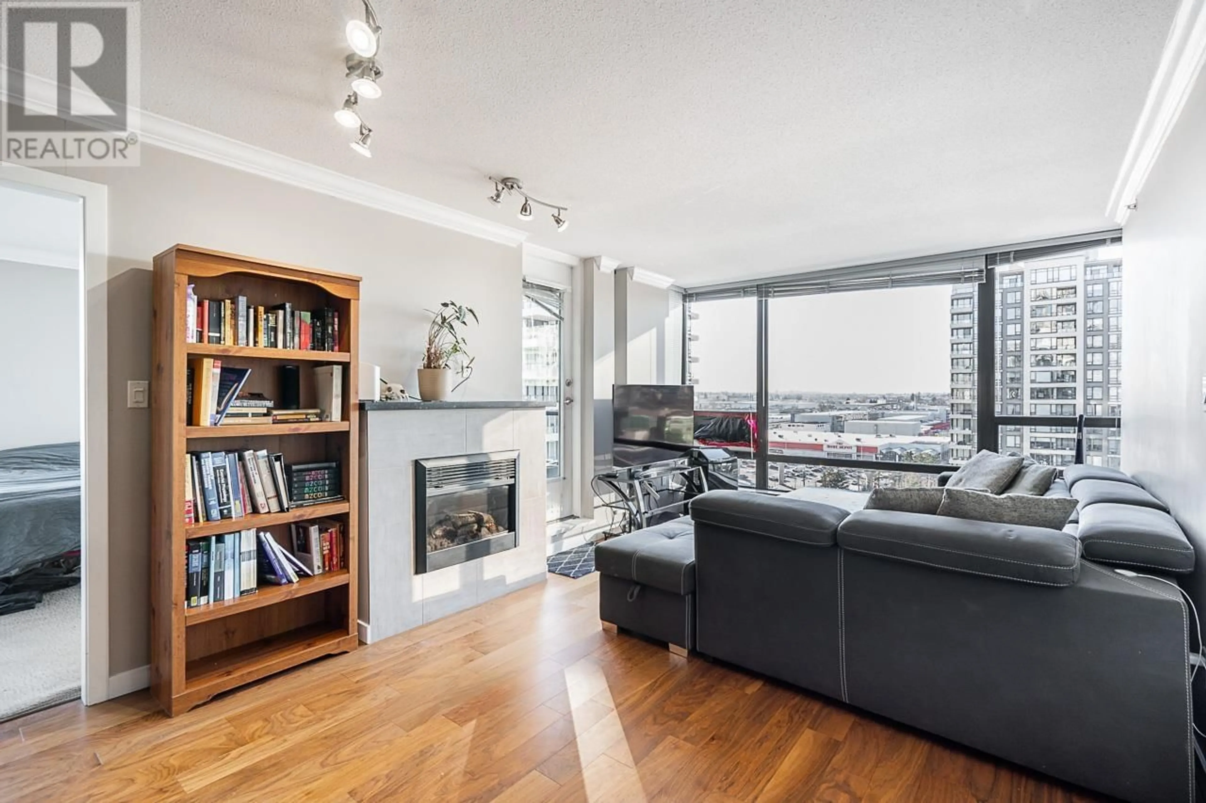 Living room with furniture, wood/laminate floor for 1404 - 4182 DAWSON STREET, Burnaby British Columbia V5C0A2