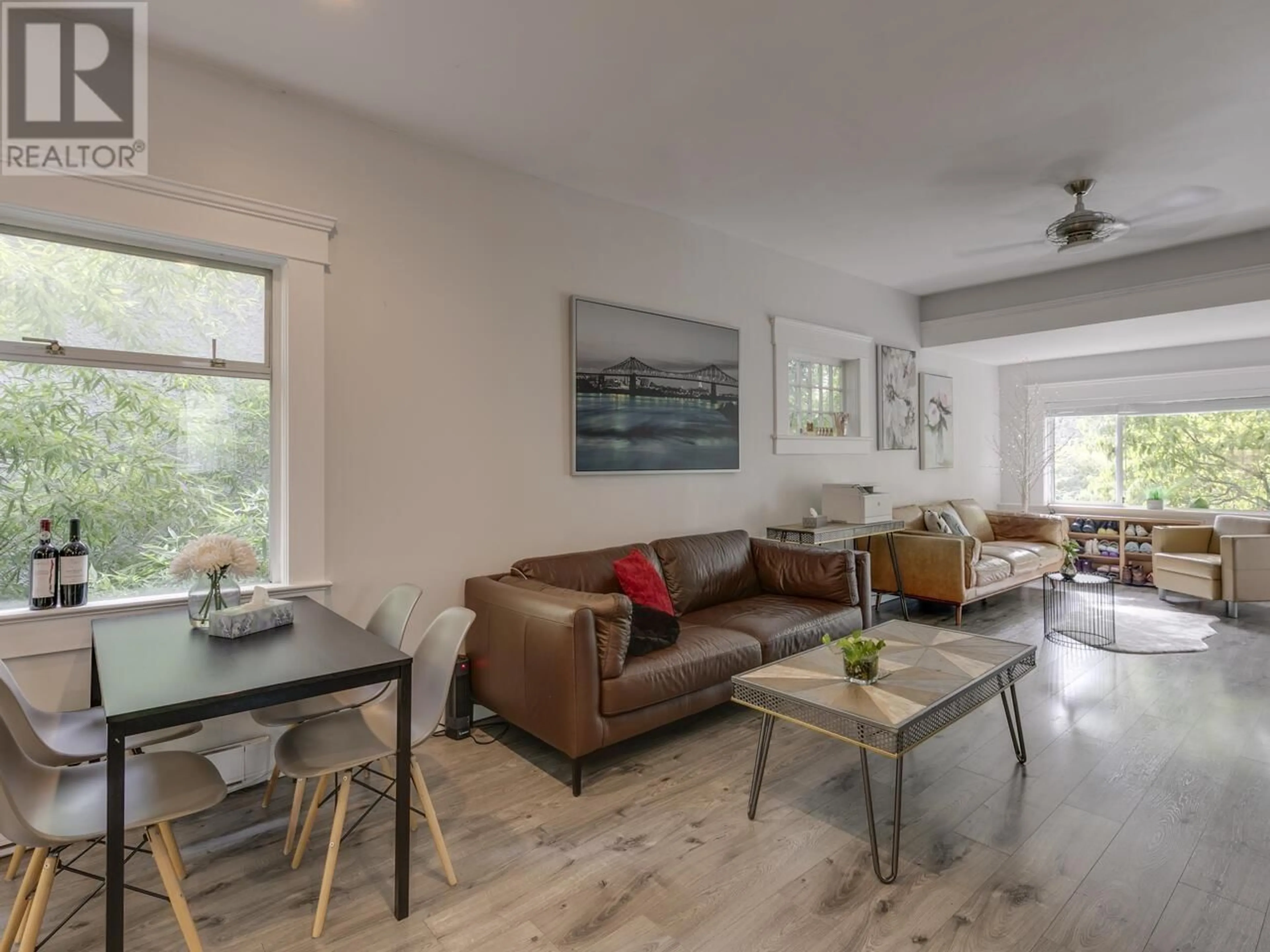 Living room with furniture, wood/laminate floor for 1577 26TH AVENUE, Vancouver British Columbia V5N2W1