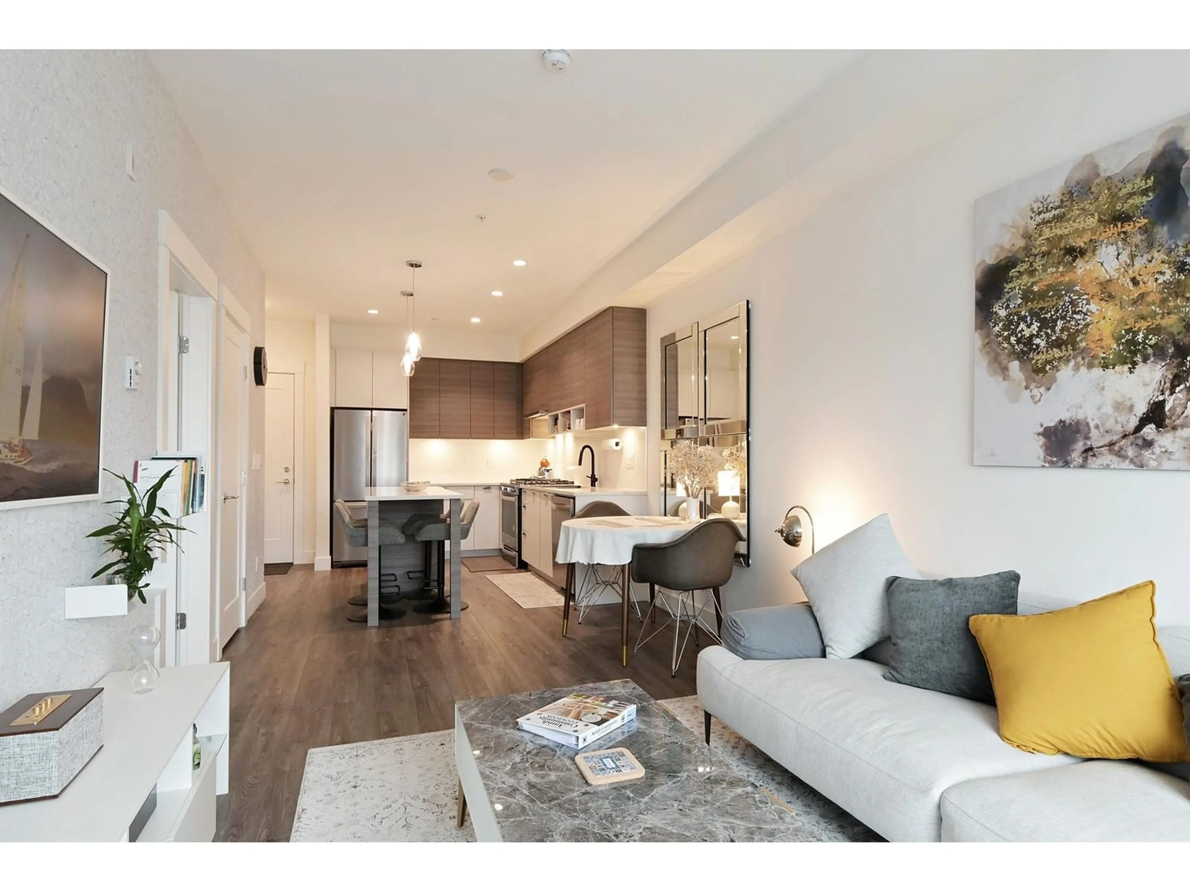 Open concept kitchen, wood/laminate floor for A308 - 20727 WILLOUGHBY TOWN CENTRE, Langley British Columbia V2Y3N1