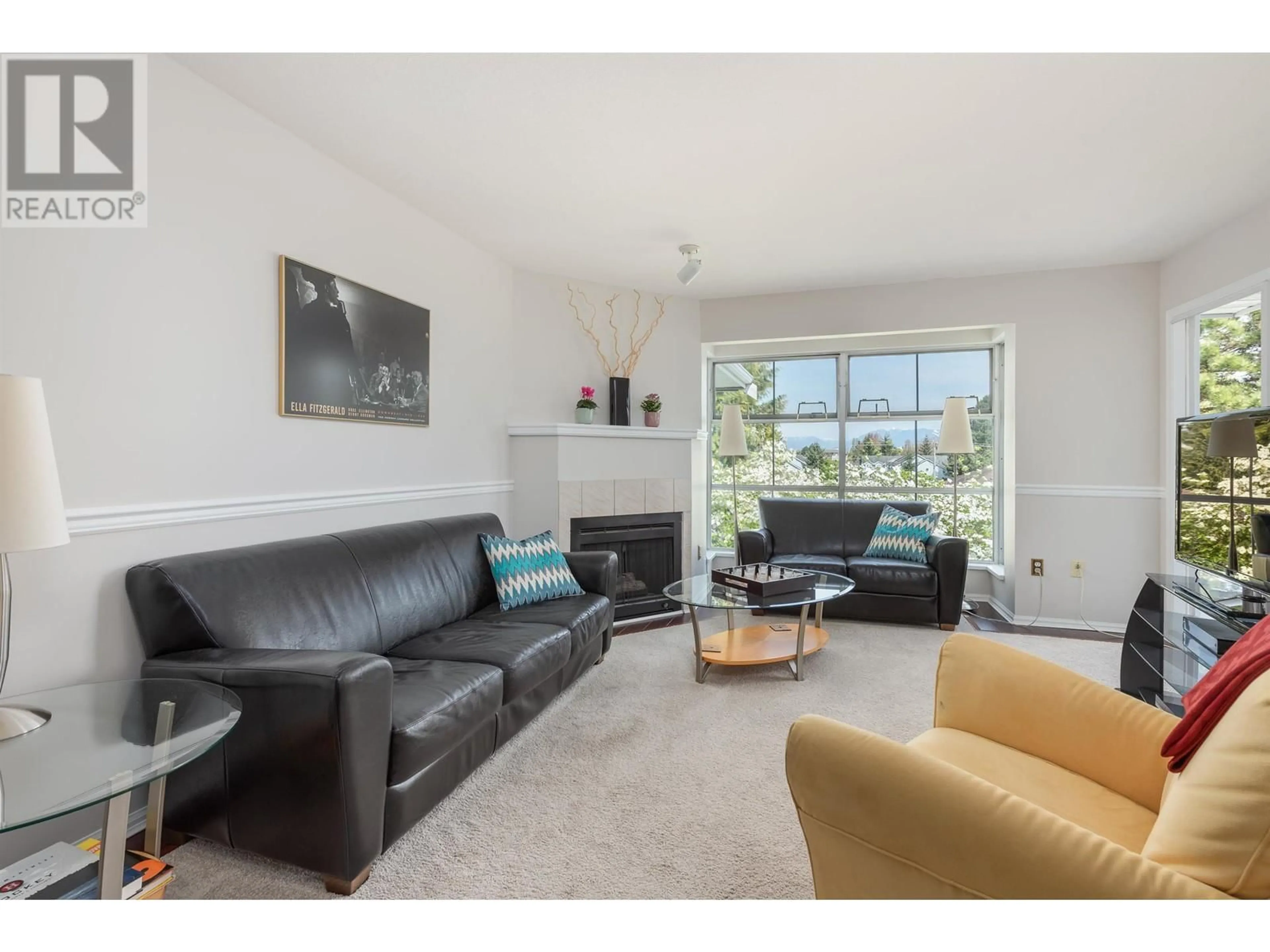 Living room with furniture, wood/laminate floor for 313 - 8611 GENERAL CURRIE ROAD, Richmond British Columbia V6Y3W4