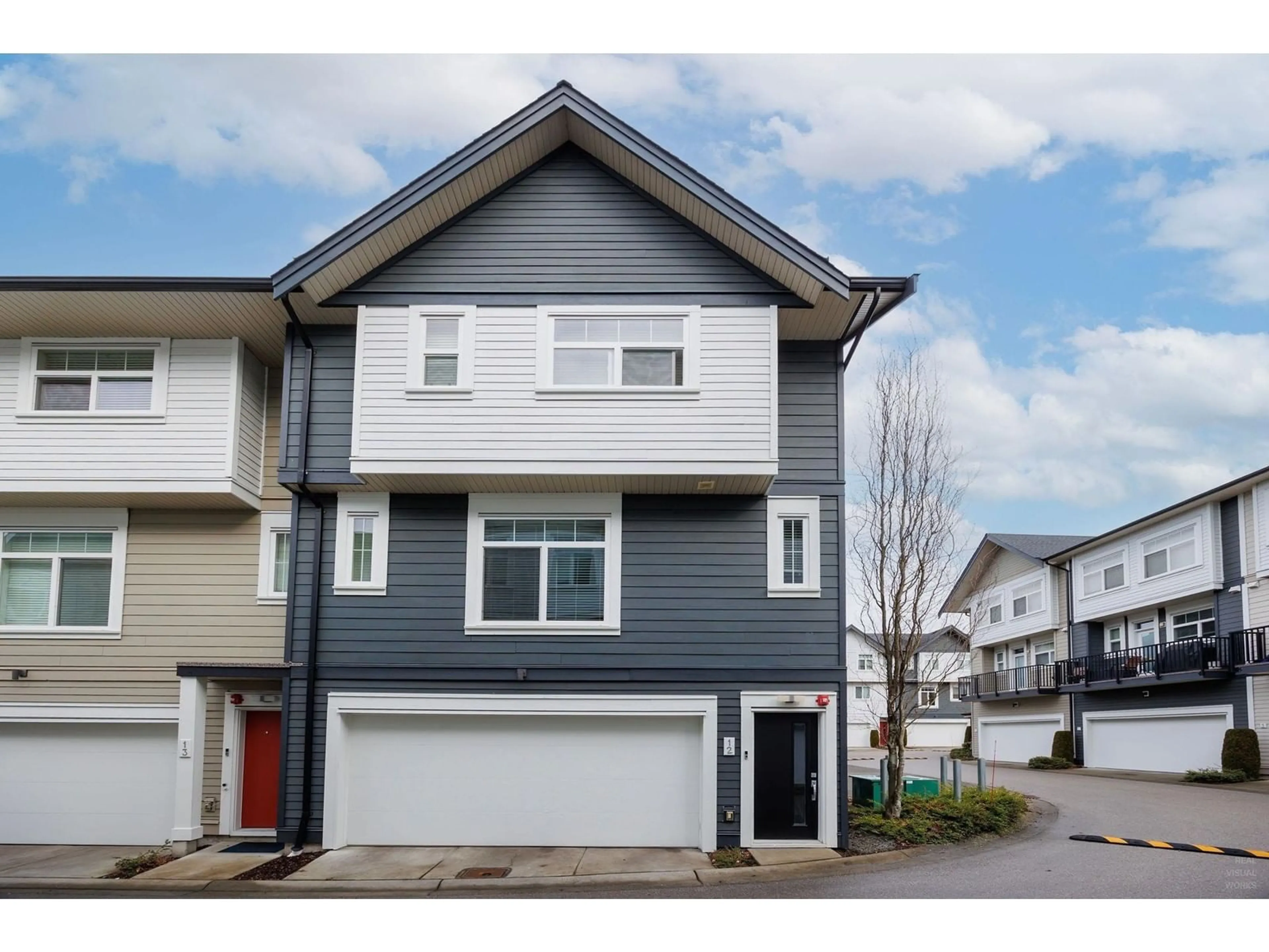 Home with vinyl exterior material, street for 12 - 7665 209, Langley British Columbia V2Y0V2